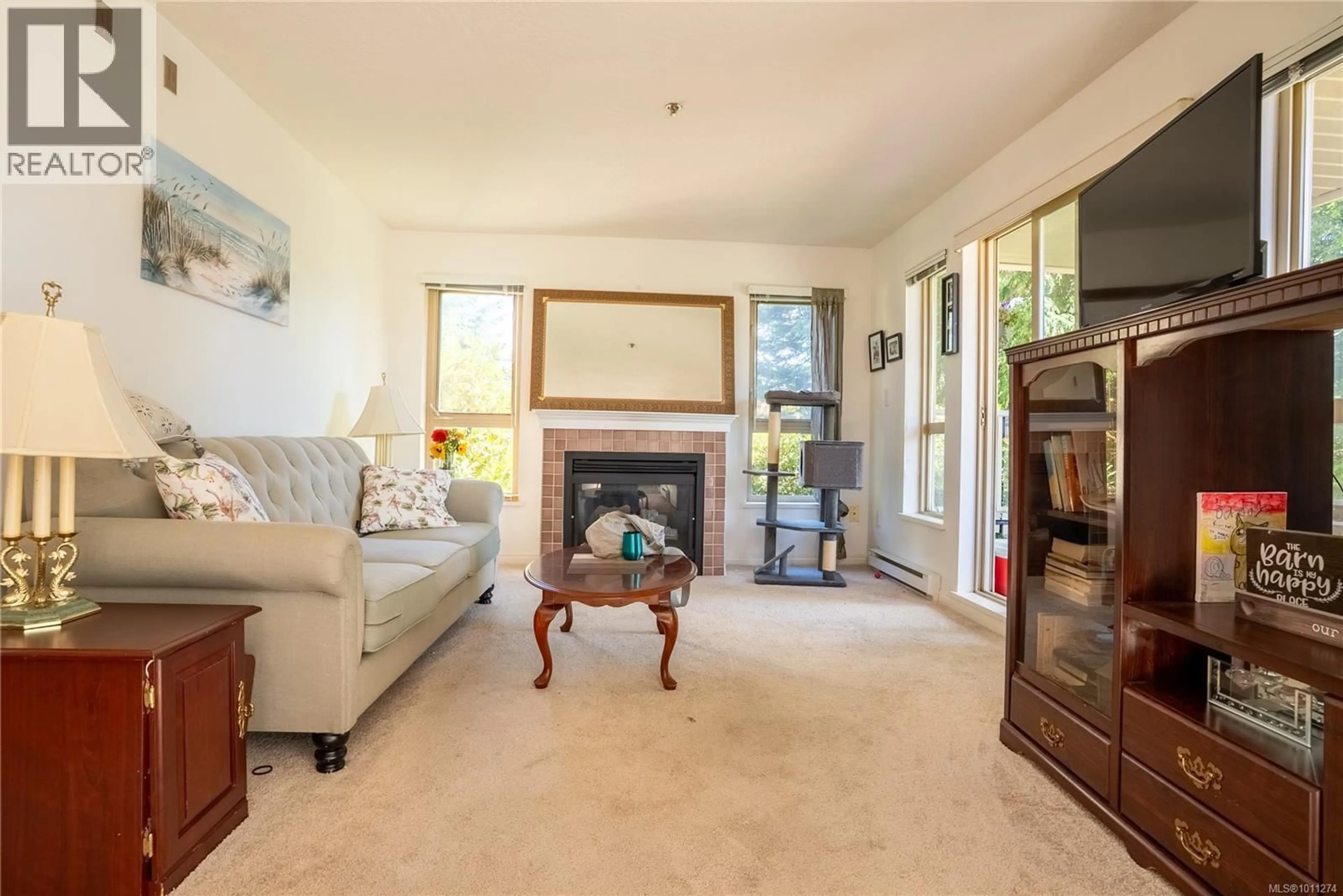 Living room with furniture, carpet floor for 110 - 121 ALDERSMITH PLACE, View Royal British Columbia V9A7M7
