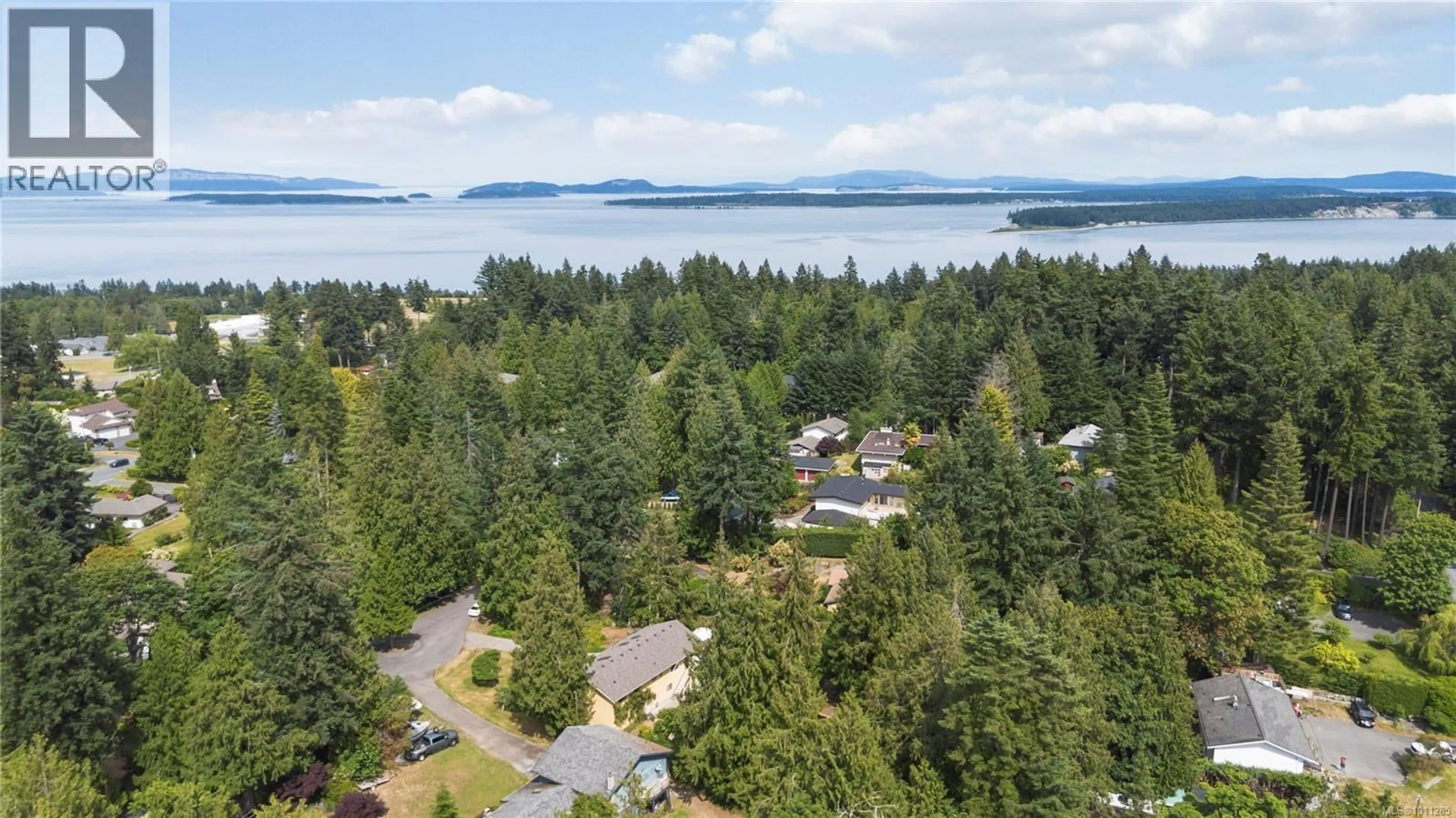 A pic from outside/outdoor area/front of a property/back of a property/a pic from drone, water/lake/river/ocean view for 1881 LLEWELLYN PLACE, North Saanich British Columbia V8L1G4