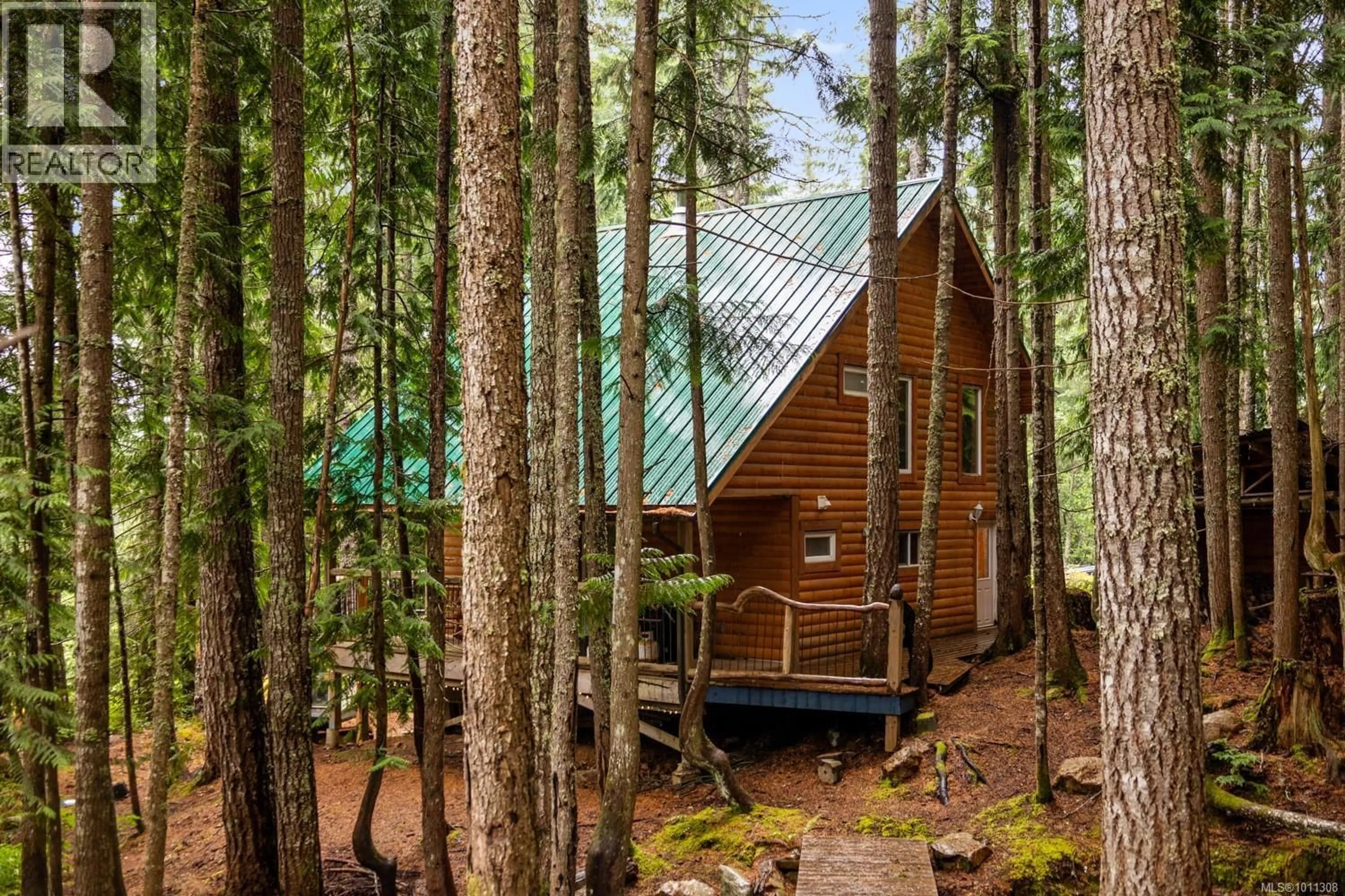 Home with vinyl exterior material, forest/trees view for 5459 BRADLEY ROAD, Courtenay British Columbia V9J1L2