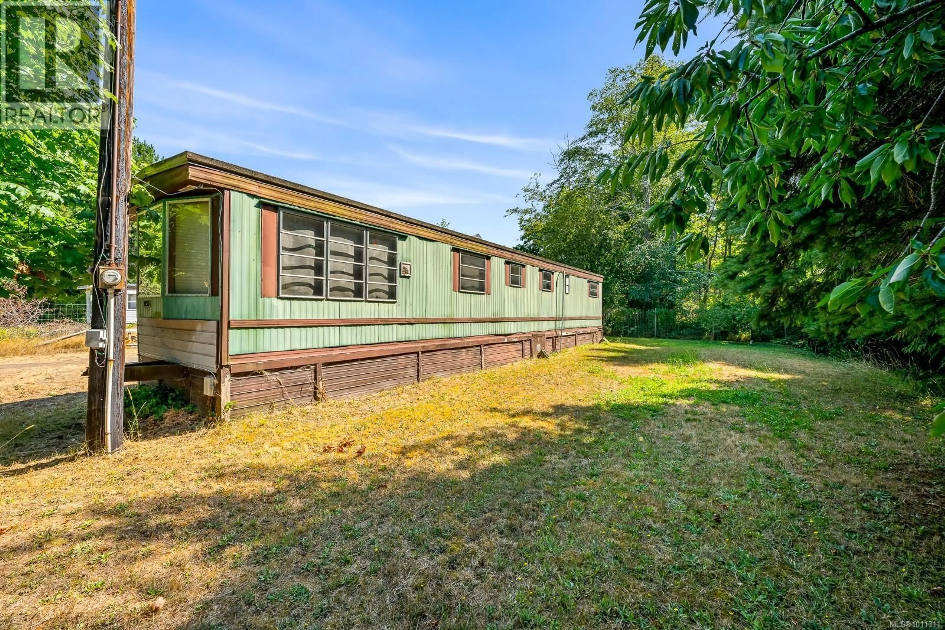 A pic from outside/outdoor area/front of a property/back of a property/a pic from drone, building for 1255 WILKINSON ROAD, Comox British Columbia V9M4B8