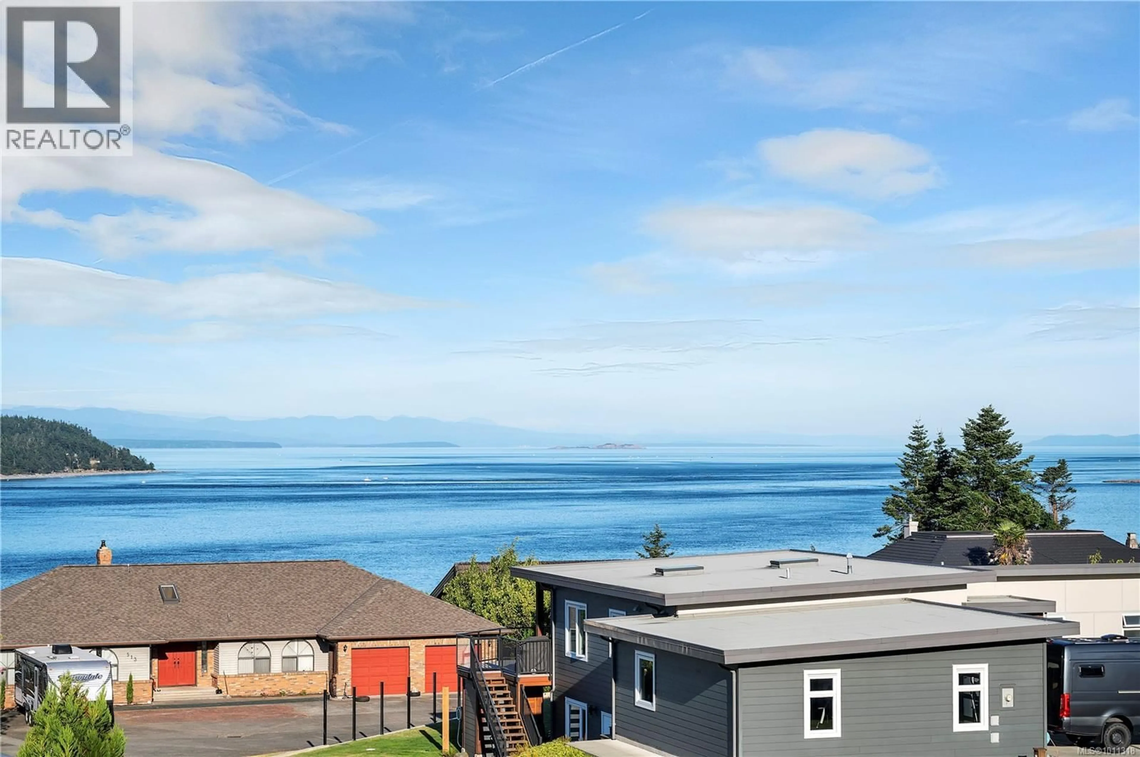 A pic from outside/outdoor area/front of a property/back of a property/a pic from drone, water/lake/river/ocean view for 492 ASH STREET, Campbell River British Columbia V9W7H5