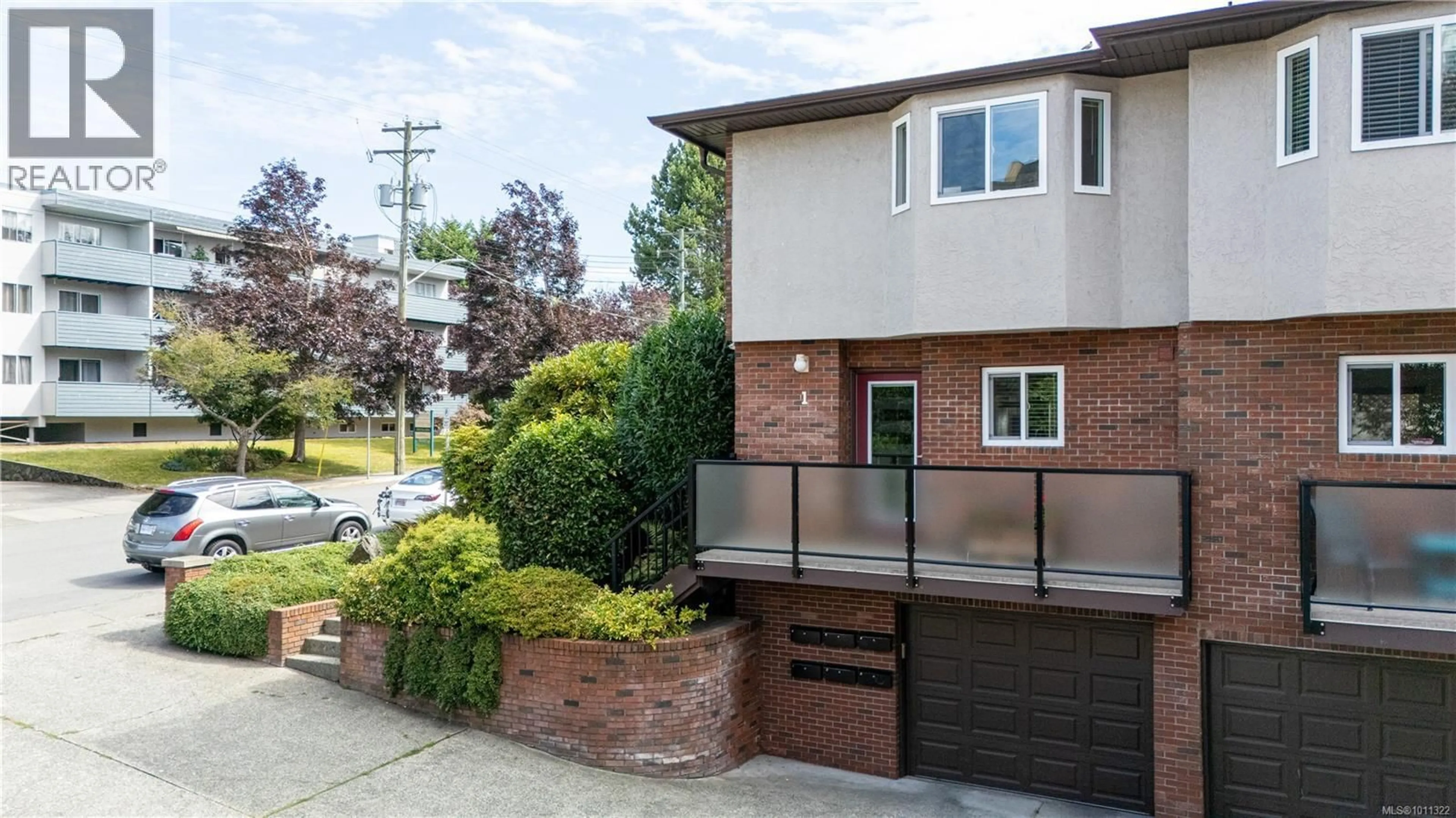 Home with brick exterior material, street for 1 - 1119 VIEW STREET, Victoria British Columbia V8V3L9
