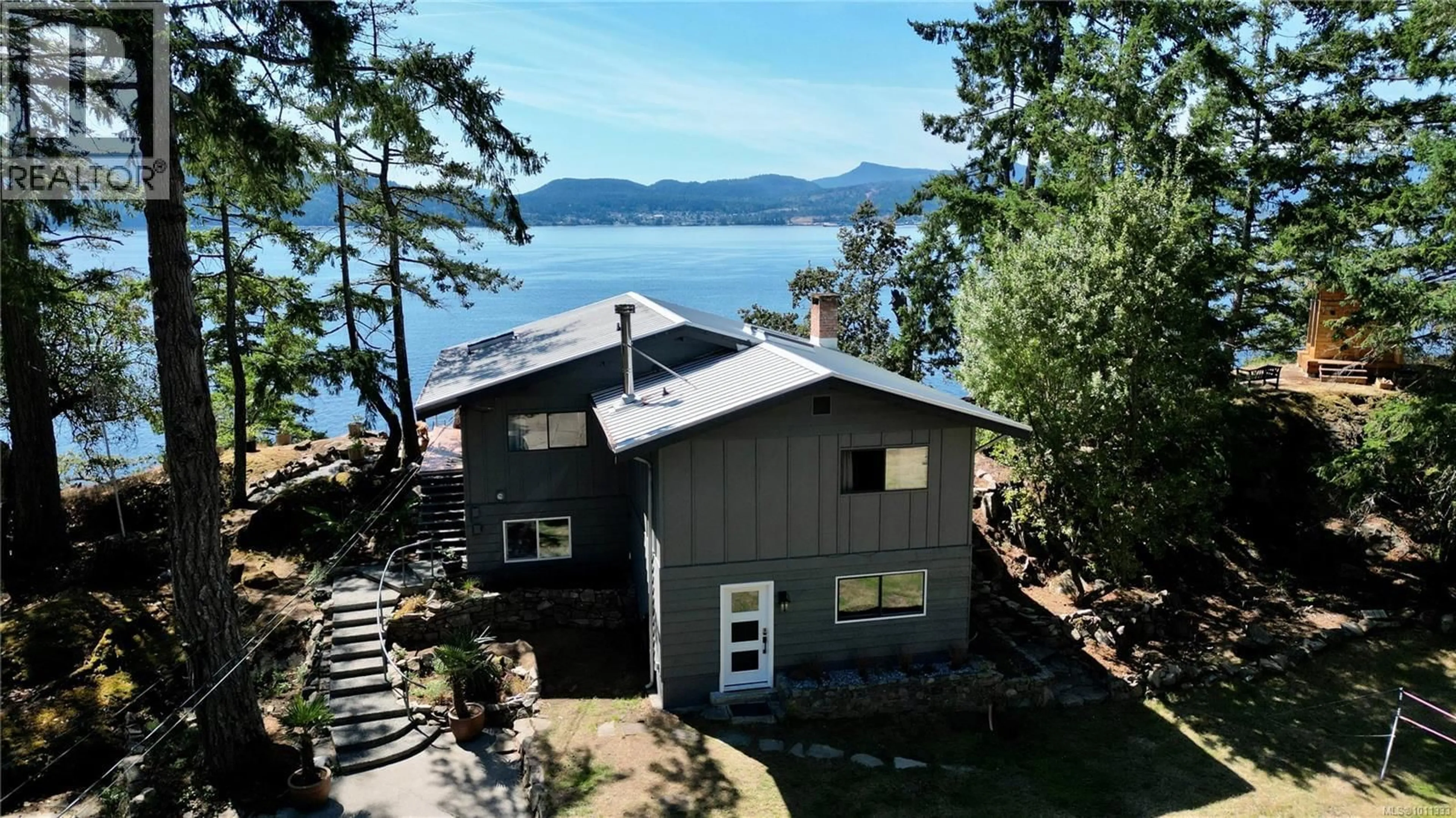A pic from outside/outdoor area/front of a property/back of a property/a pic from drone, water/lake/river/ocean view for 285 MOUNTAIN PARK DRIVE, Salt Spring British Columbia V8K1G3