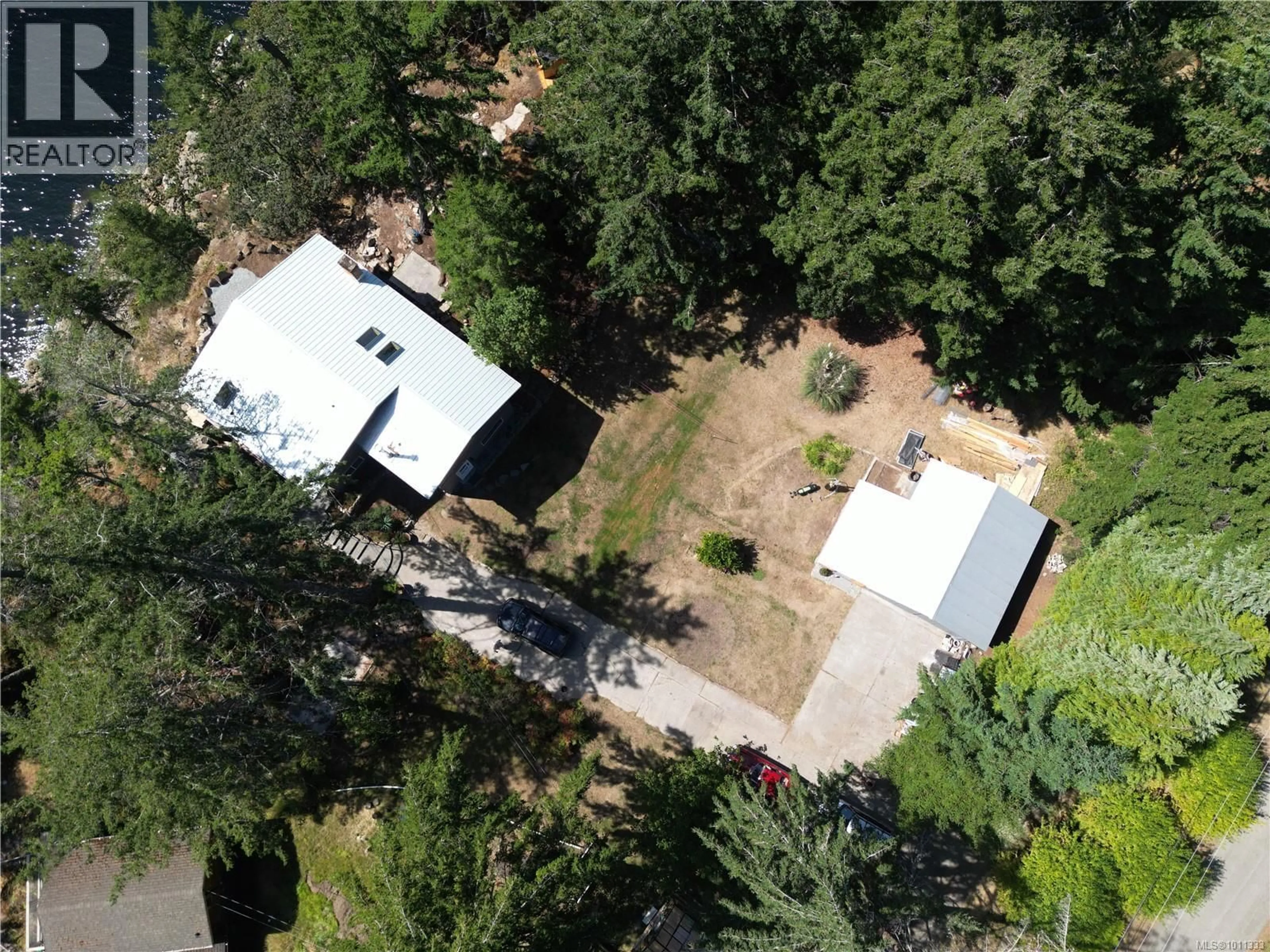 A pic from outside/outdoor area/front of a property/back of a property/a pic from drone, forest/trees view for 285 MOUNTAIN PARK DRIVE, Salt Spring British Columbia V8K1G3