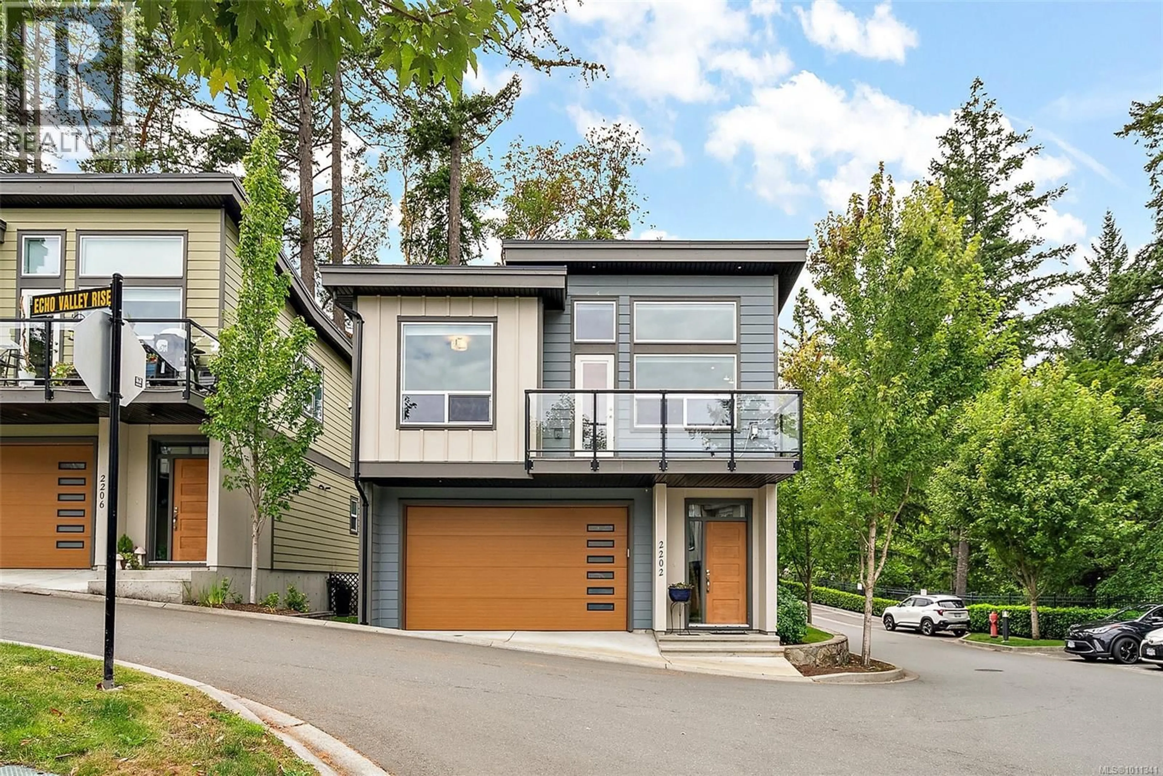 Home with vinyl exterior material, street for 2202 ECHO VALLEY RISE, Langford British Columbia V9B0Y2
