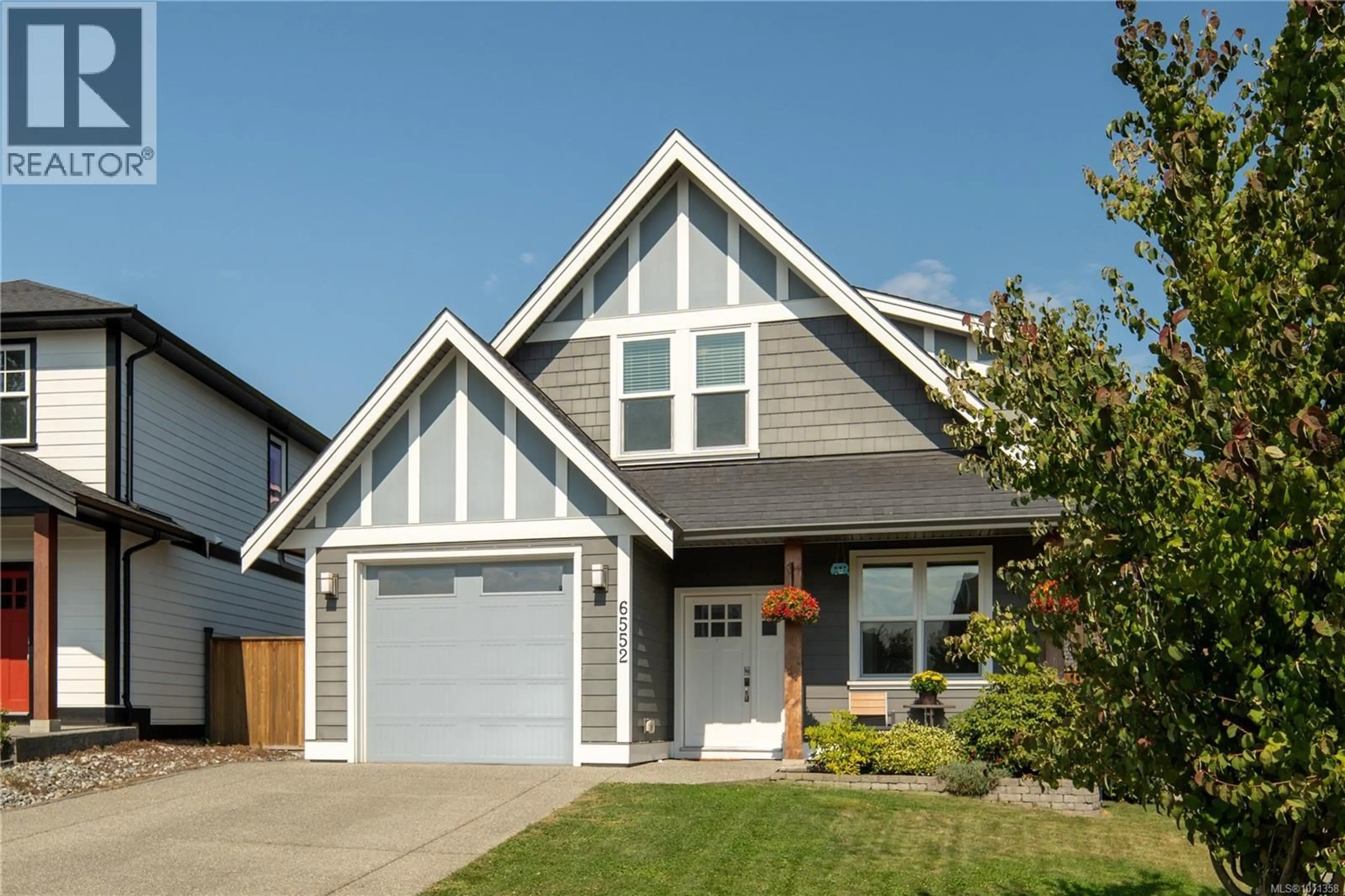Home with vinyl exterior material, street for 6552 ARRANWOOD DRIVE, Sooke British Columbia V9Z0W4