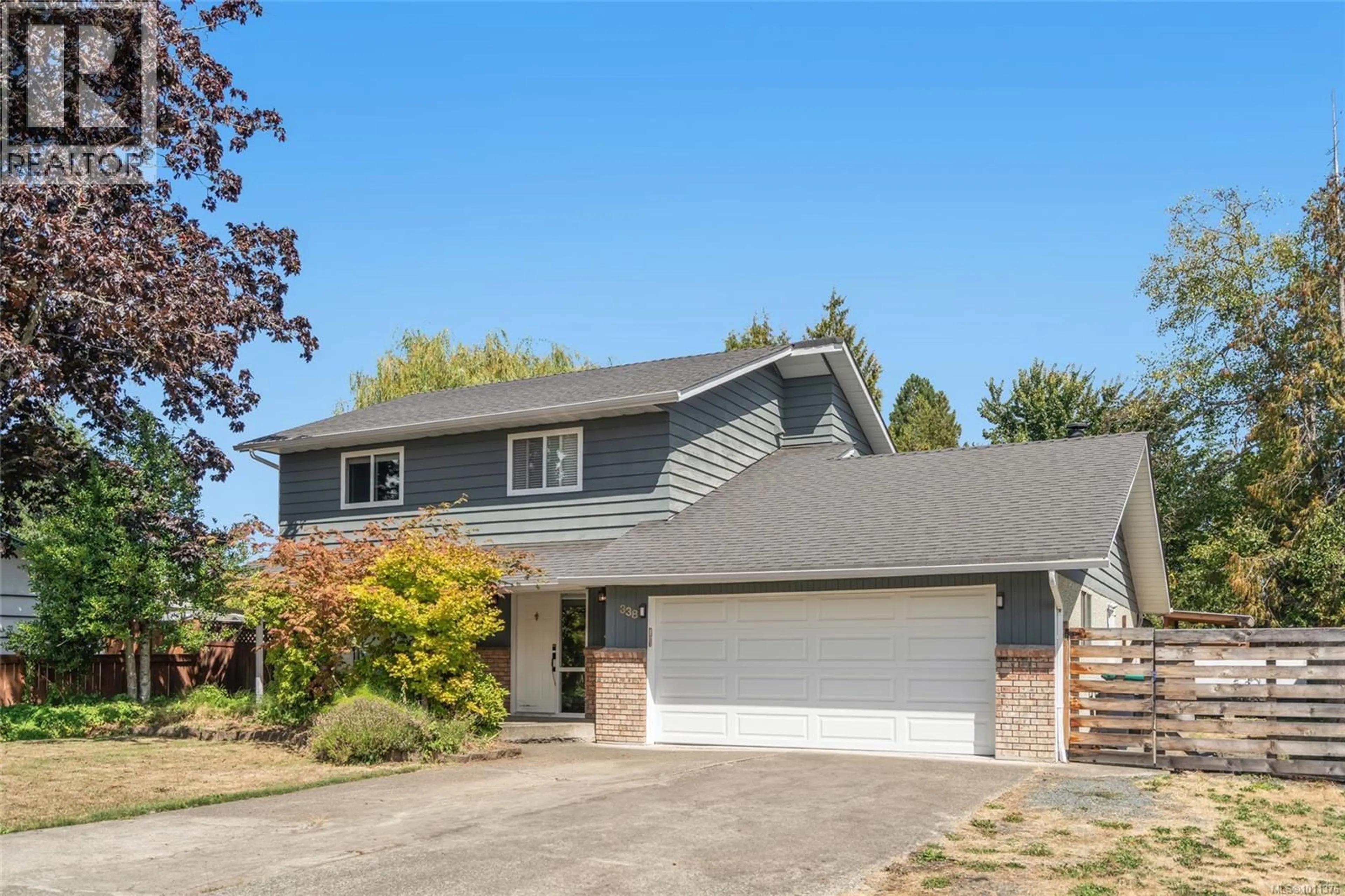 Home with vinyl exterior material, street for 338 MCKINNON STREET, Parksville British Columbia V9P1H7