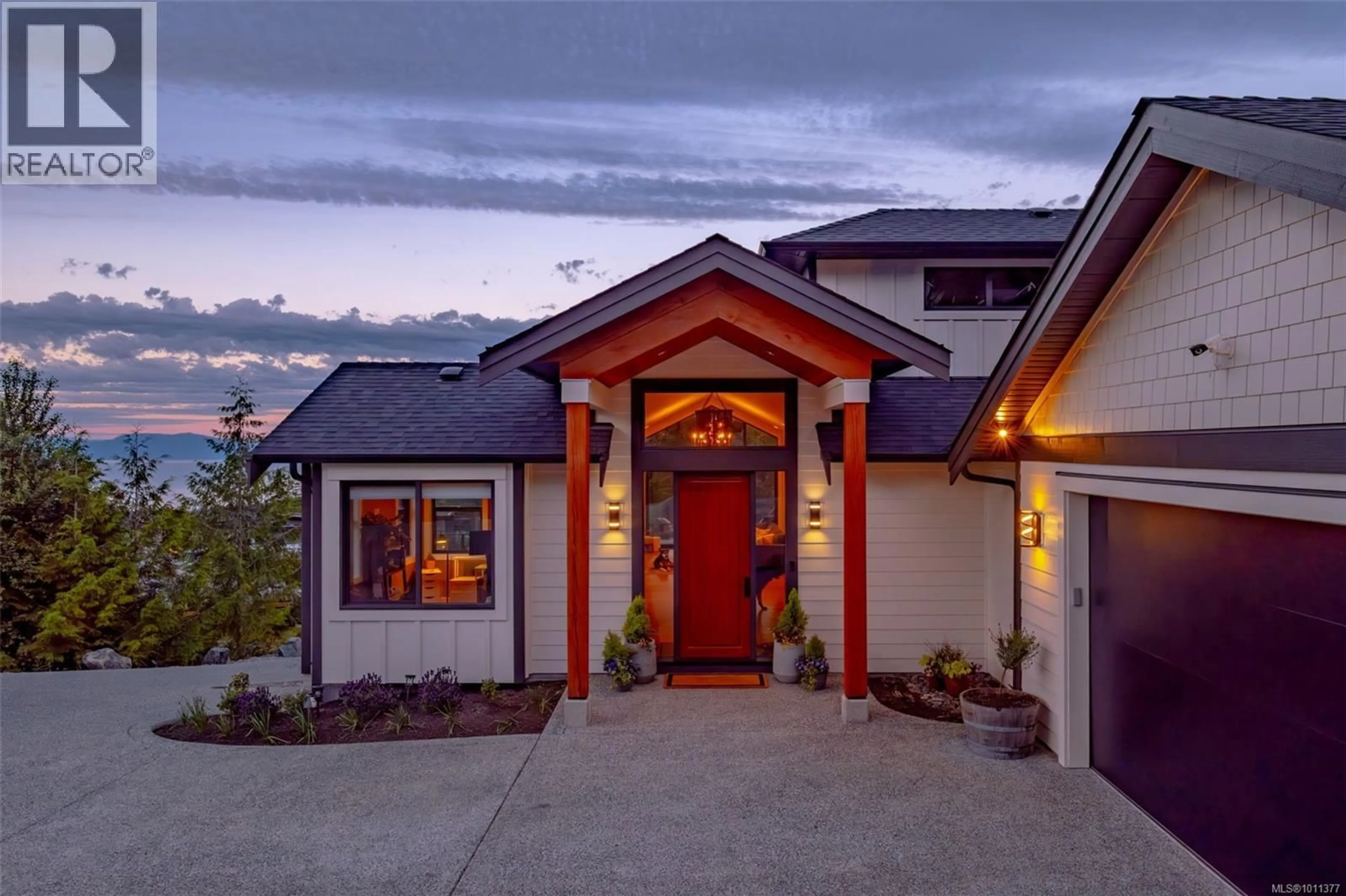 Home with brick exterior material, mountain view for 7462 COPLEY RIDGE DRIVE, Lantzville British Columbia V0R2H0