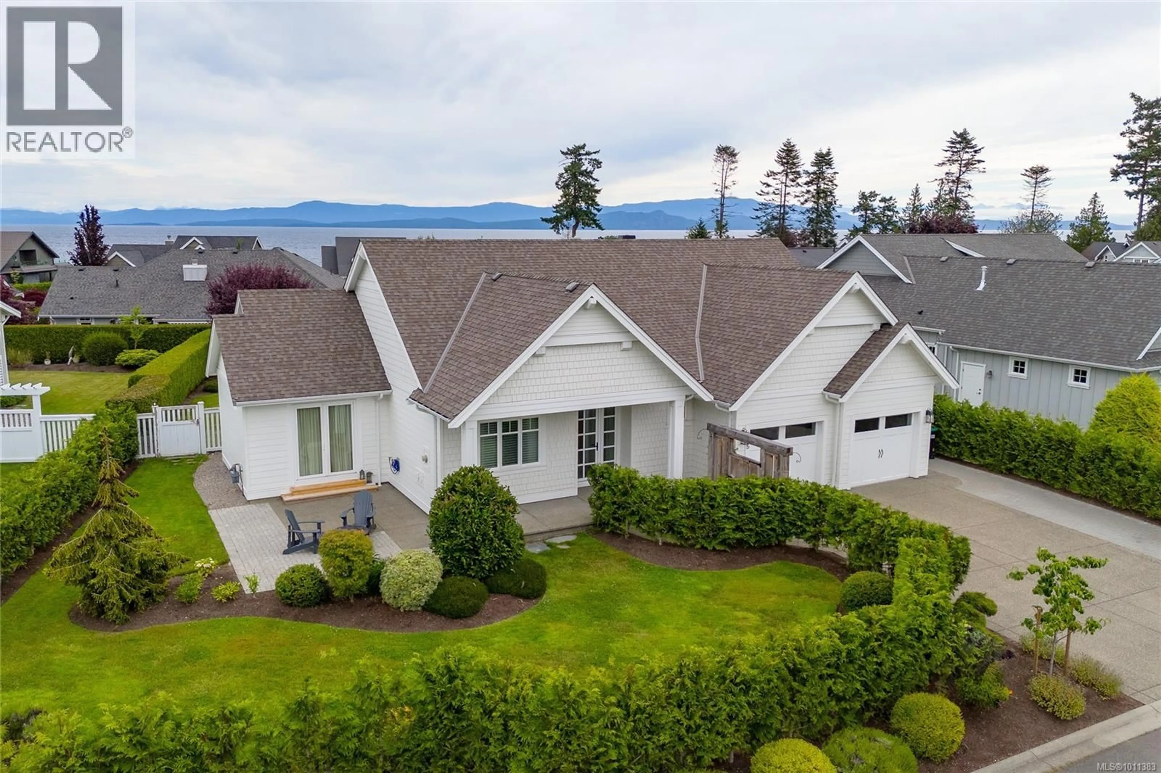 A pic from outside/outdoor area/front of a property/back of a property/a pic from drone, mountain view for 815 BLUFFS DRIVE, Qualicum Beach British Columbia V9K0A2
