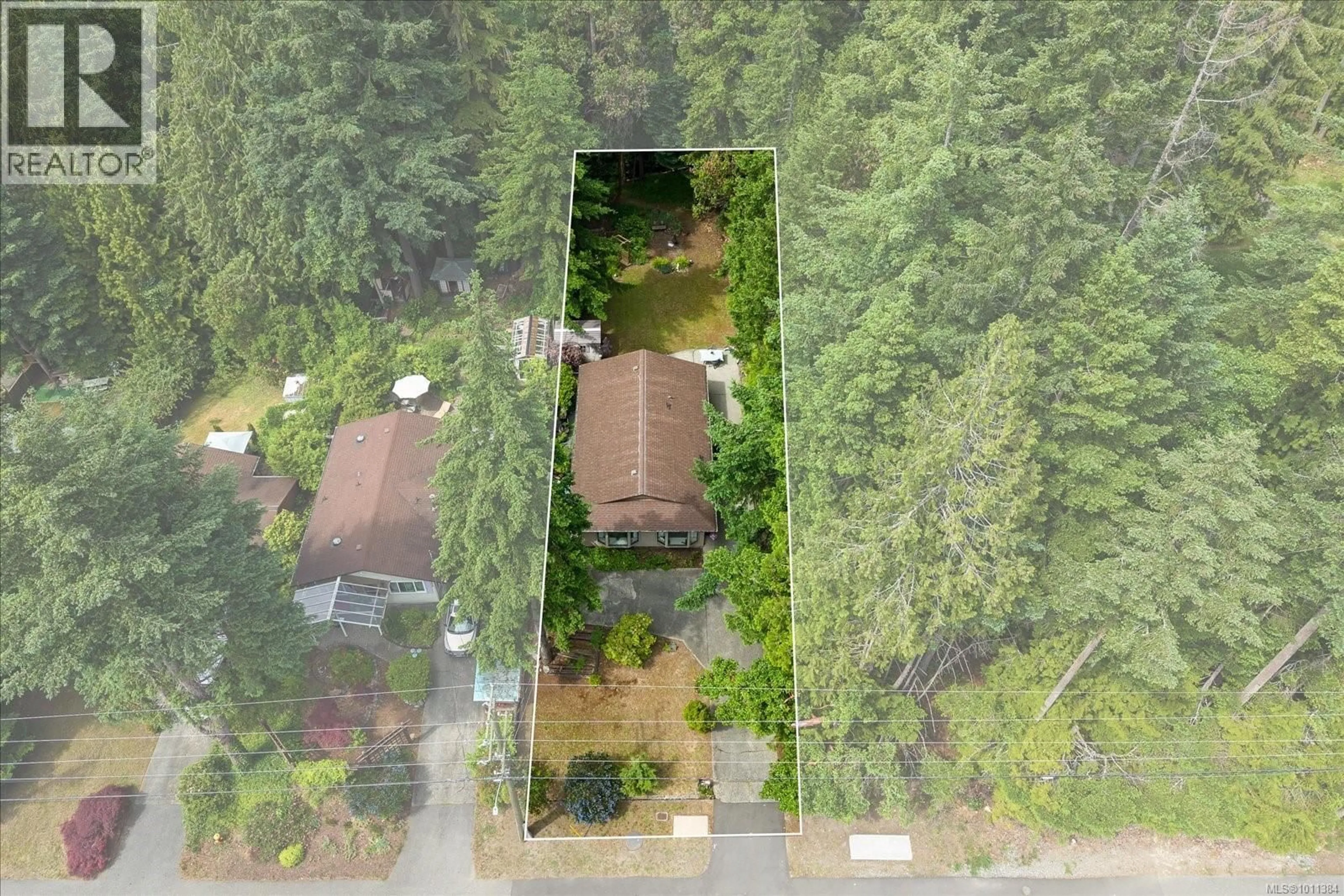 A pic from outside/outdoor area/front of a property/back of a property/a pic from drone, forest/trees view for 6064 NELSON ROAD, Nanaimo British Columbia V9T5N8