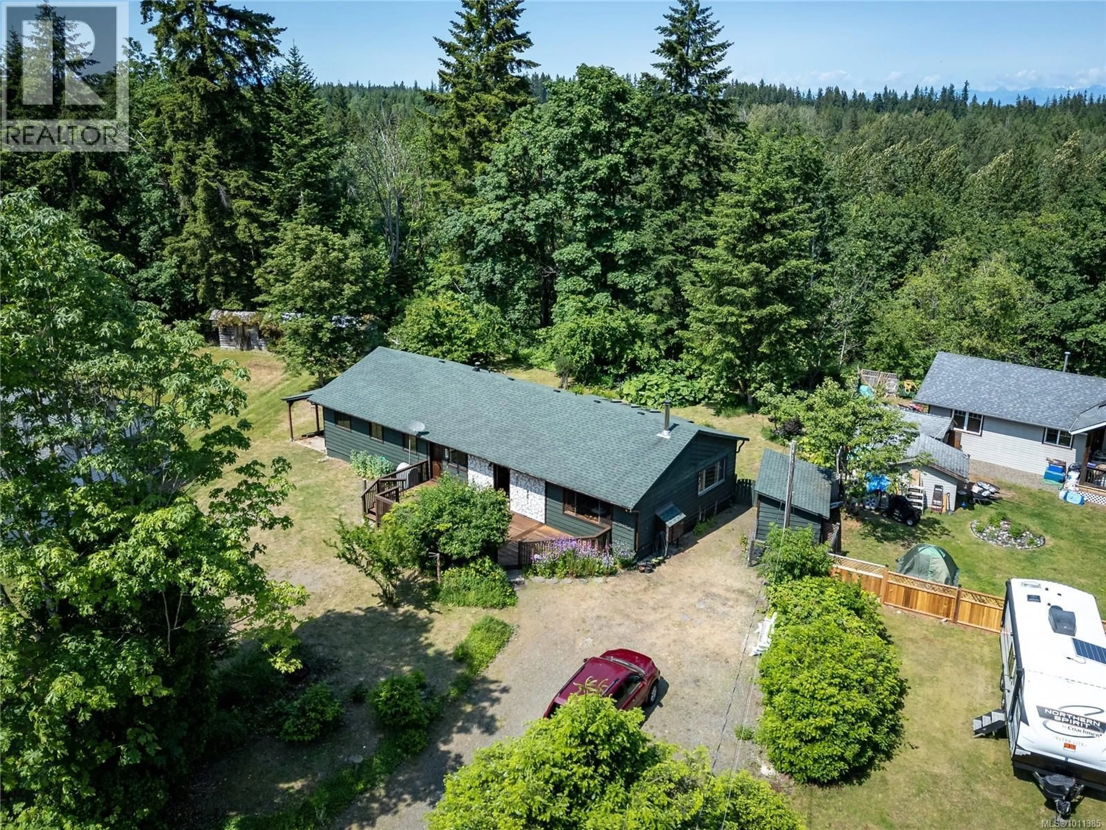 A pic from outside/outdoor area/front of a property/back of a property/a pic from drone, forest/trees view for 9437 MARTIN PARK DRIVE, Black Creek British Columbia V9J1C3