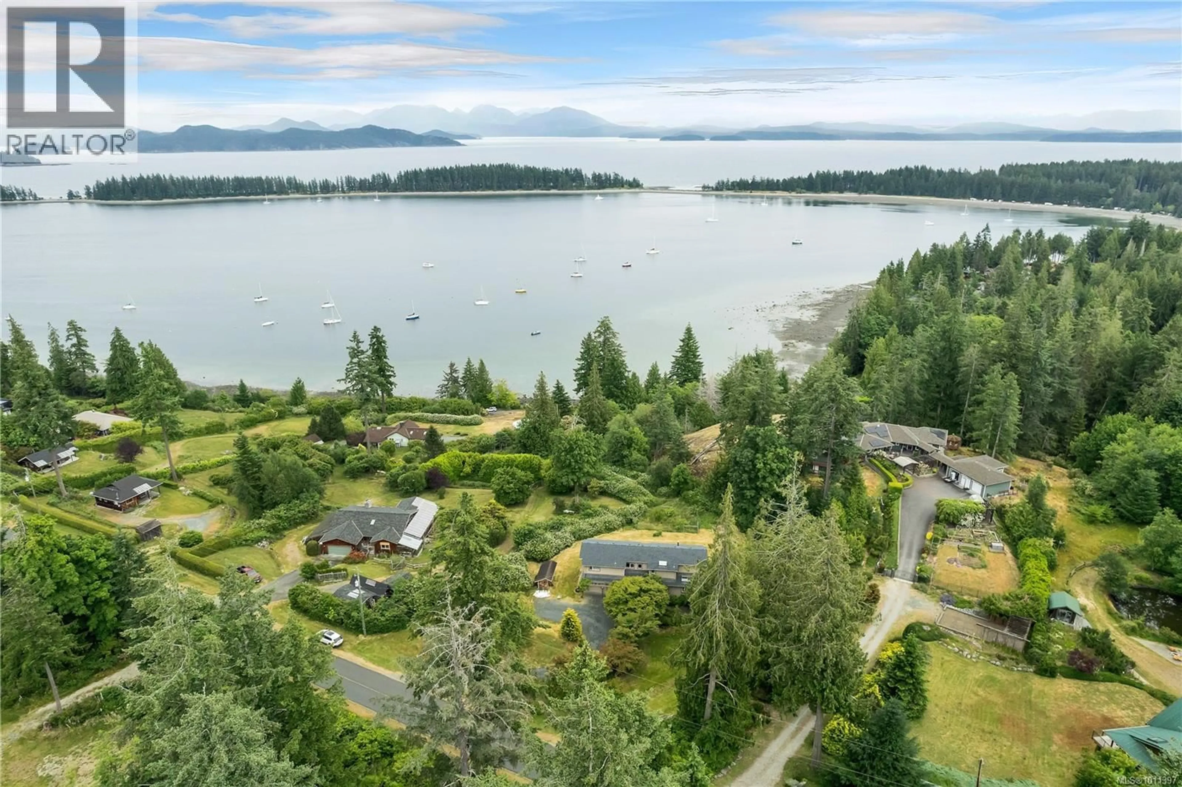 A pic from outside/outdoor area/front of a property/back of a property/a pic from drone, water/lake/river/ocean view for 1418 SCHOONER ROAD, Quadra Island British Columbia V0P1H0