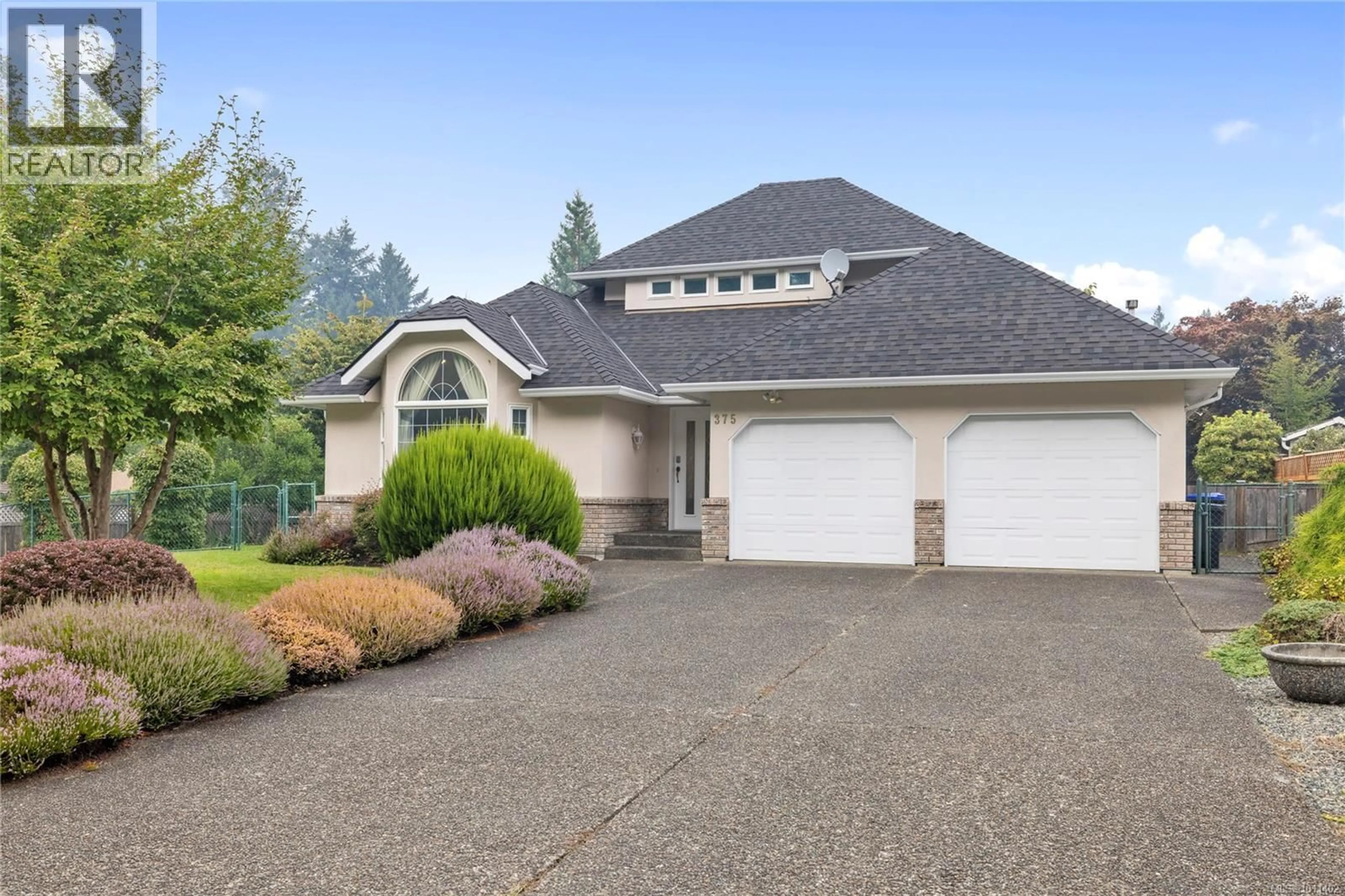 Home with vinyl exterior material, street for 375 PALM DRIVE, Qualicum Beach British Columbia V9K2H3