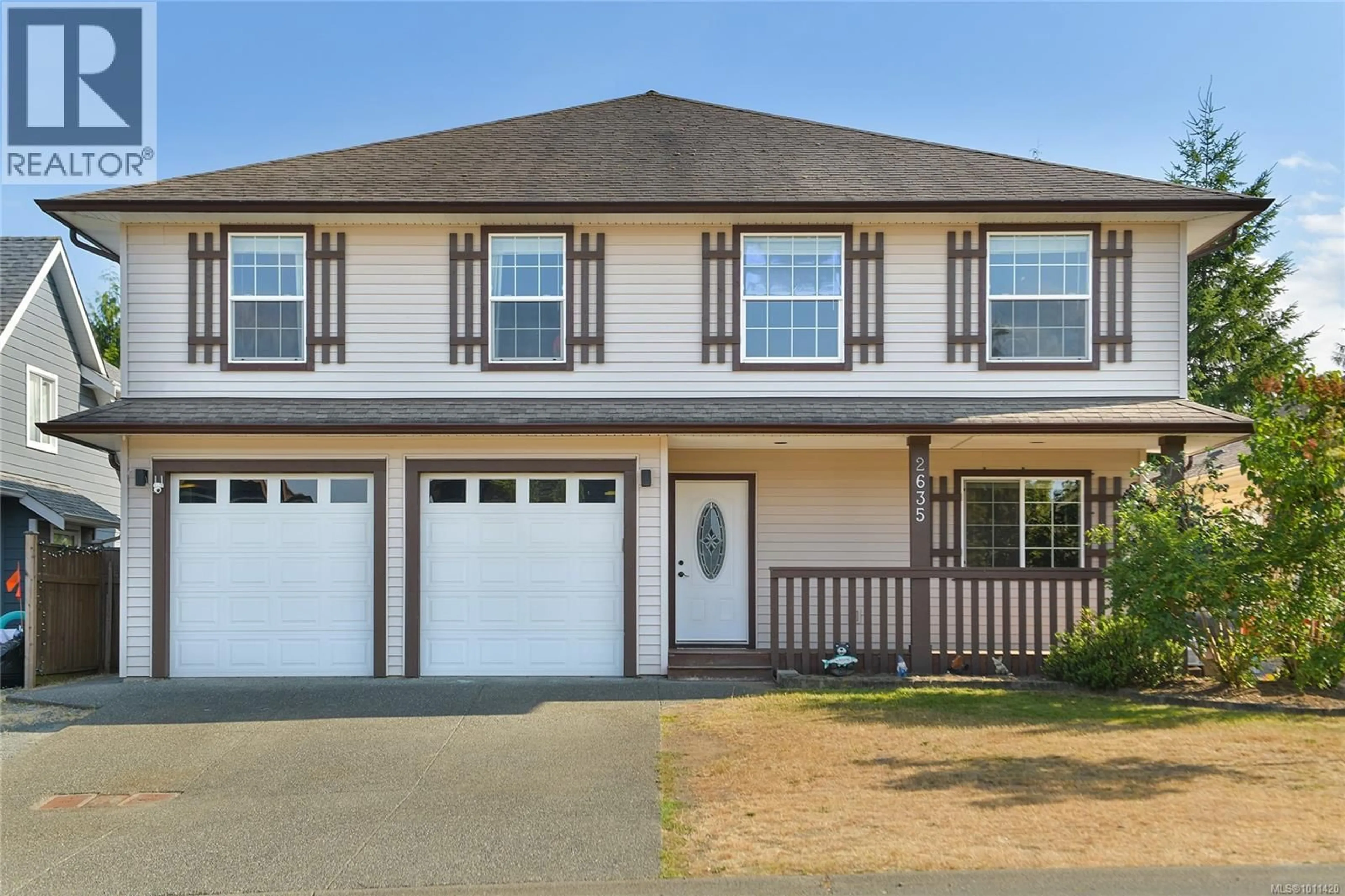 Home with vinyl exterior material, street for 2635 RYDAL AVENUE, Cumberland British Columbia V0R1S0