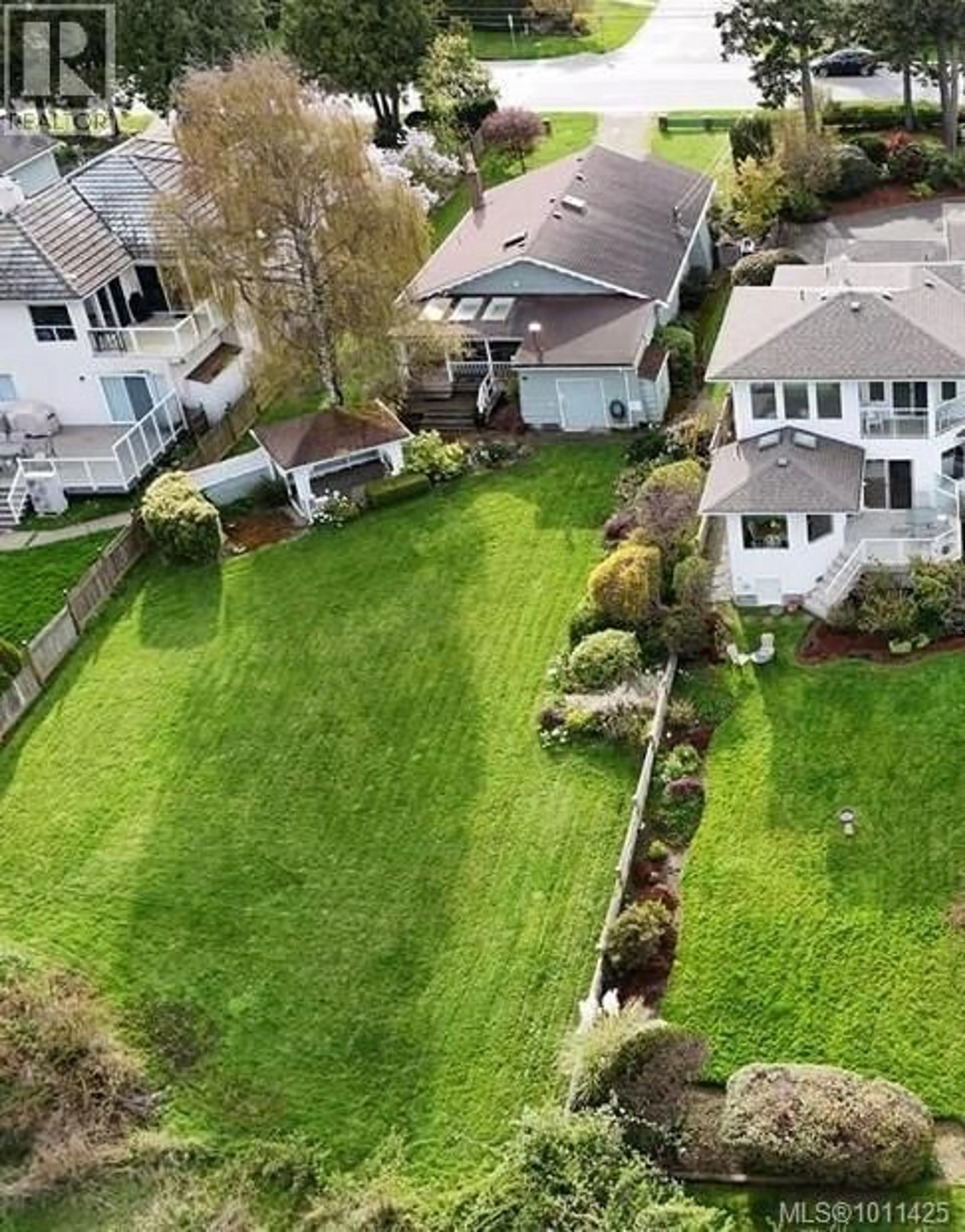 A pic from outside/outdoor area/front of a property/back of a property/a pic from drone, street for 10231 RESTHAVEN DRIVE, Sidney British Columbia V8L3H2