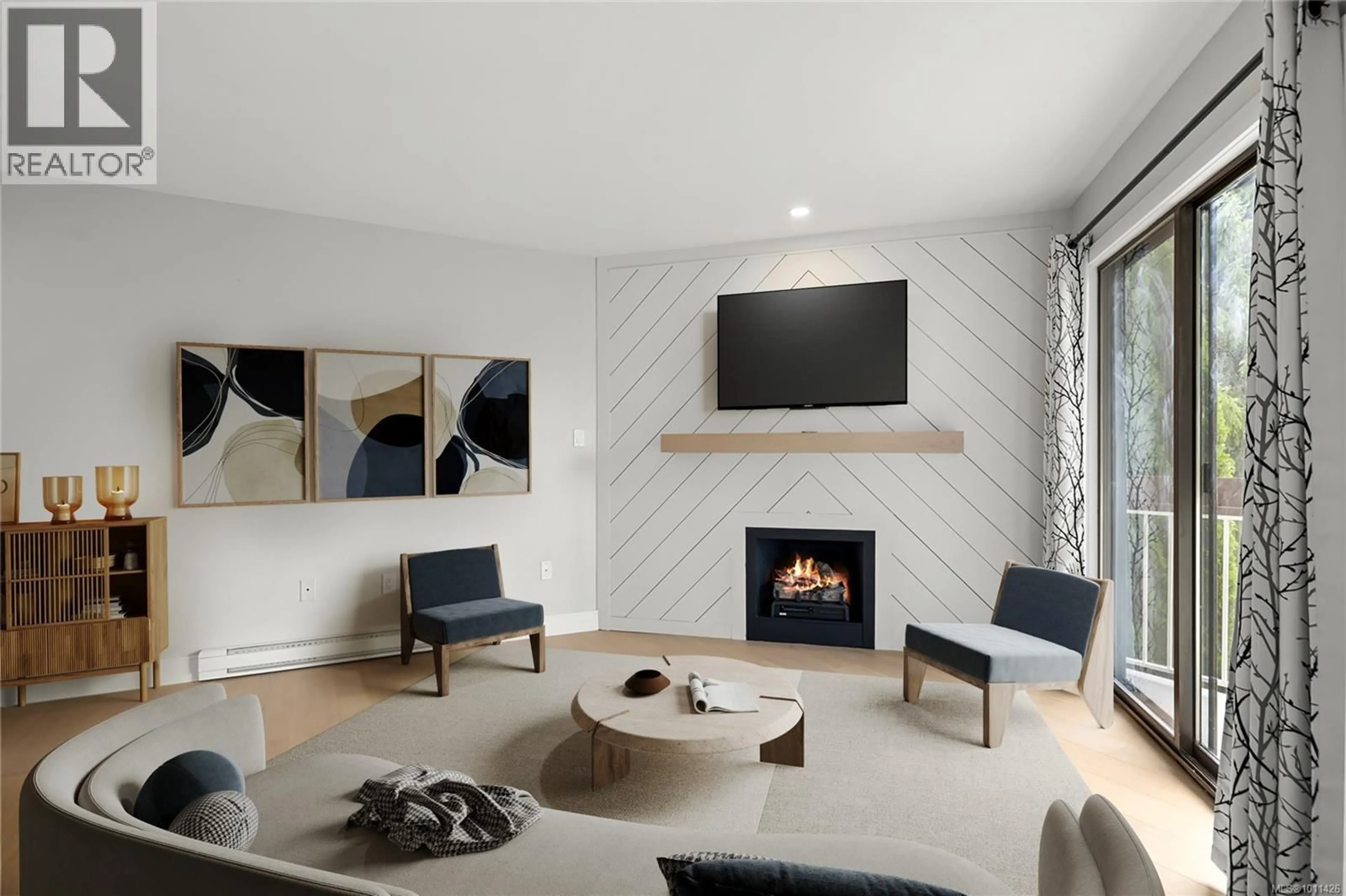 Living room with furniture, unknown for 306 - 75 GORGE ROAD WEST, Saanich British Columbia V9A7A9