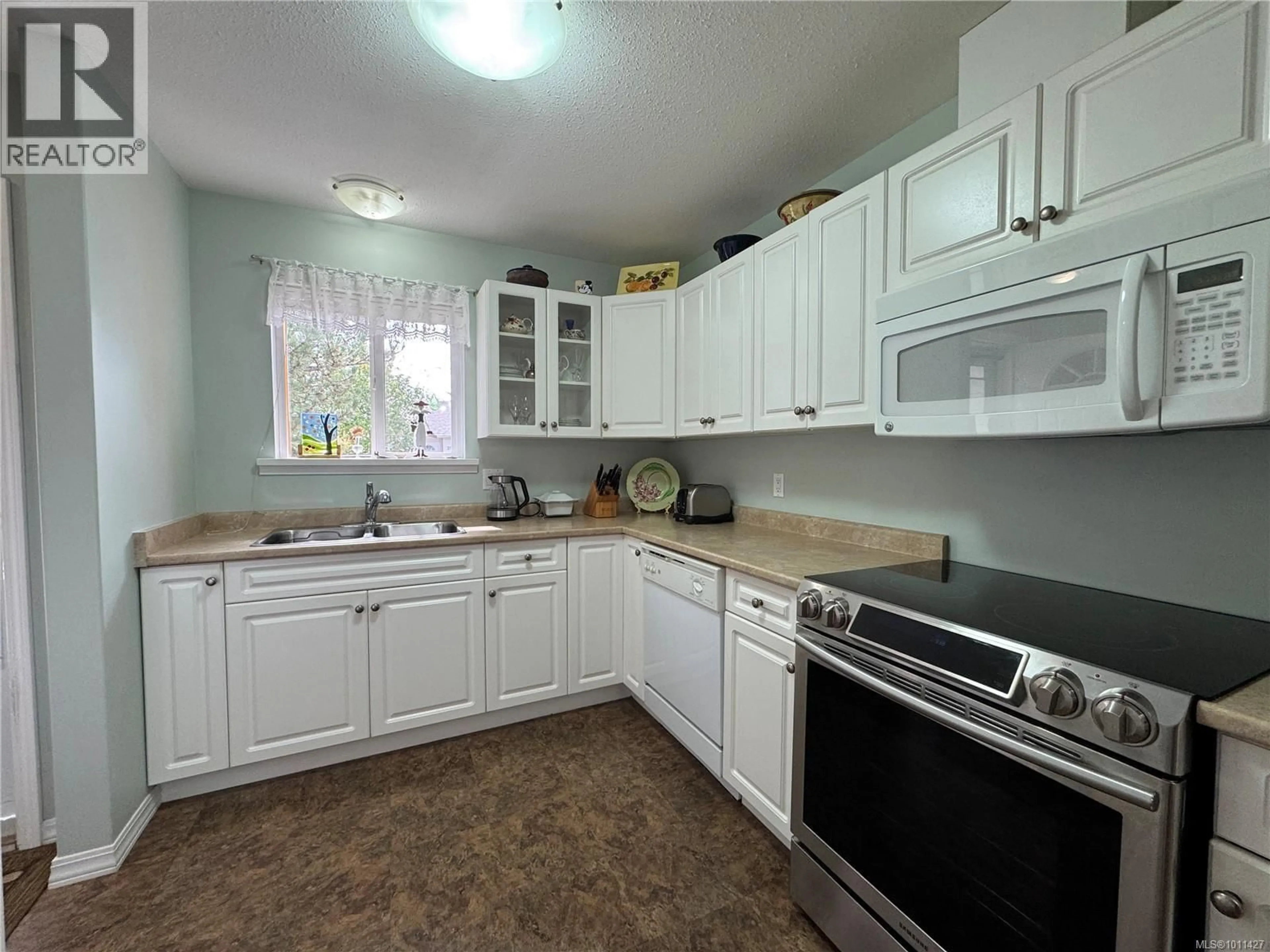 Standard kitchen, ceramic/tile floor for 23 - 2197 MURRELET DRIVE, Comox British Columbia V9M3Y1