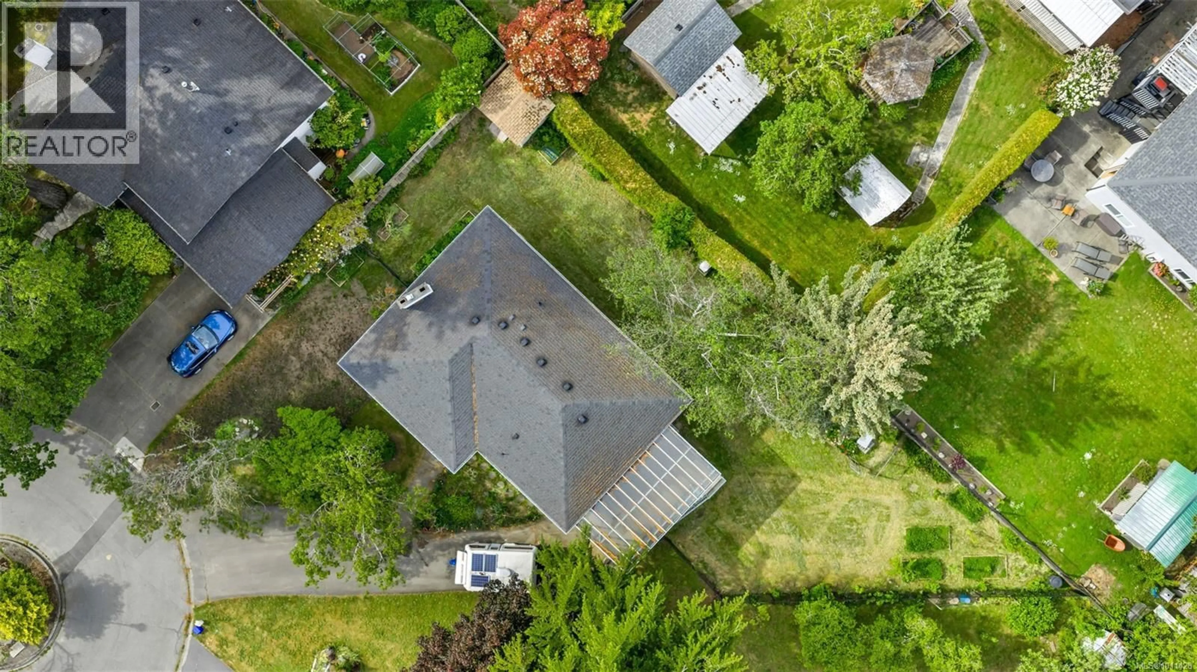 A pic from outside/outdoor area/front of a property/back of a property/a pic from drone, street for 1616 SARITA PLACE, Saanich British Columbia V8N3J4