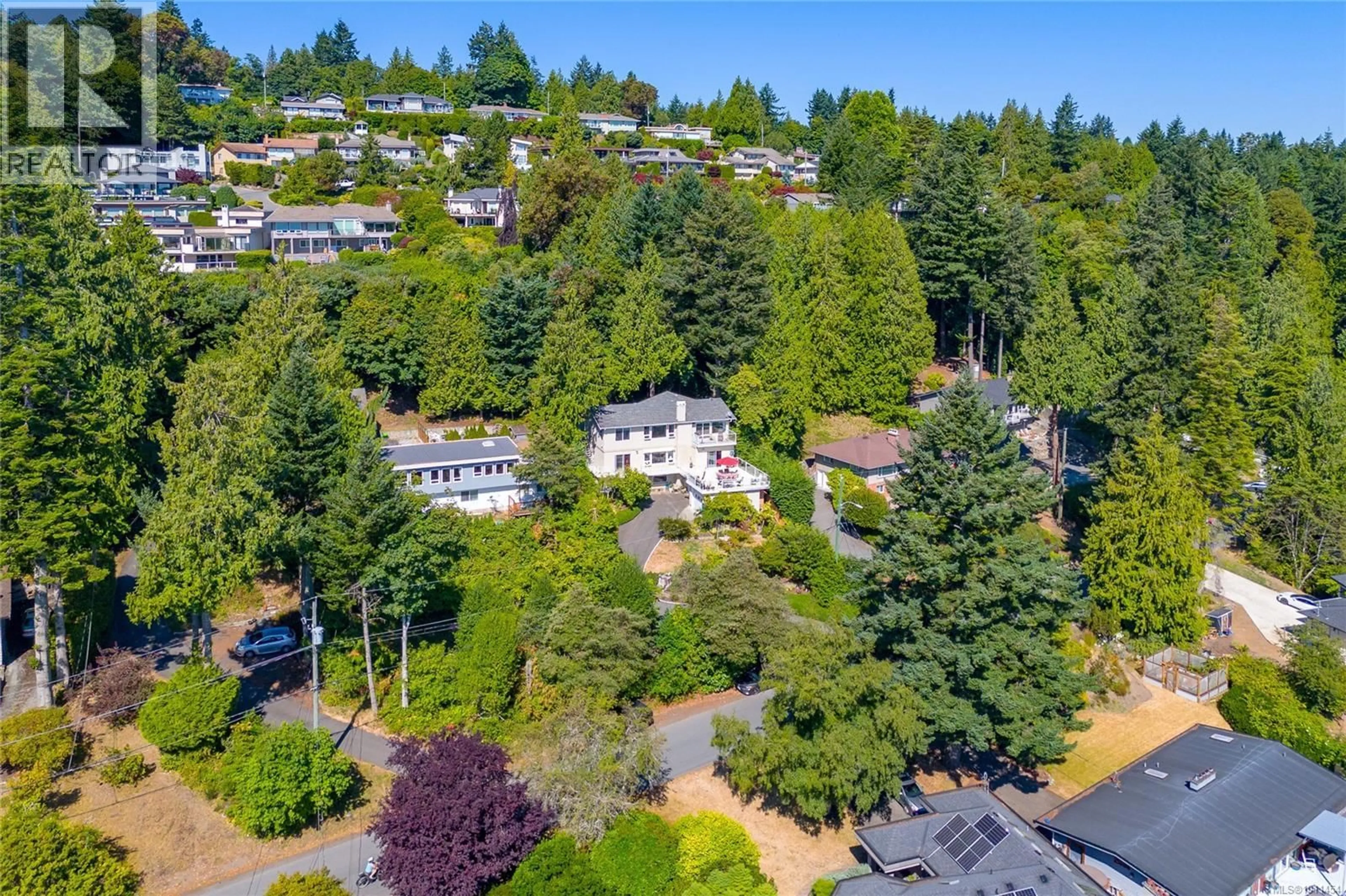 A pic from outside/outdoor area/front of a property/back of a property/a pic from drone, unknown for 4964 LOCHSIDE DRIVE, Saanich British Columbia V8Y2E4