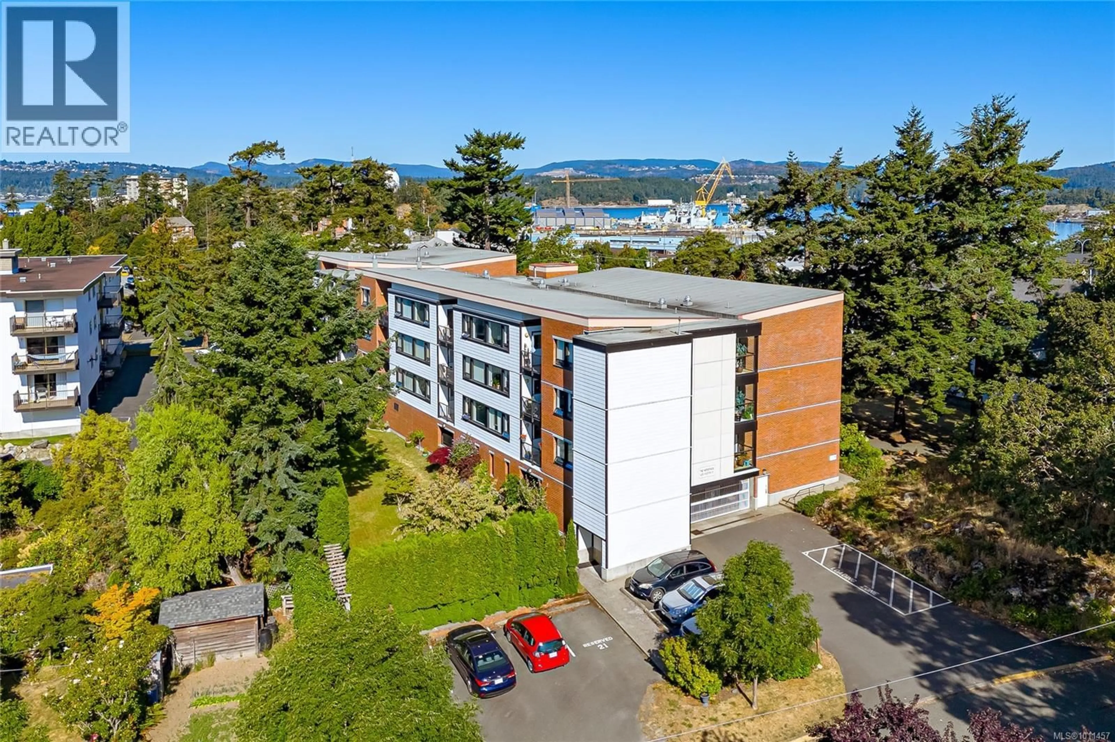 A pic from outside/outdoor area/front of a property/back of a property/a pic from drone, water/lake/river/ocean view for 205 - 520 FOSTER STREET, Esquimalt British Columbia V9A3R4