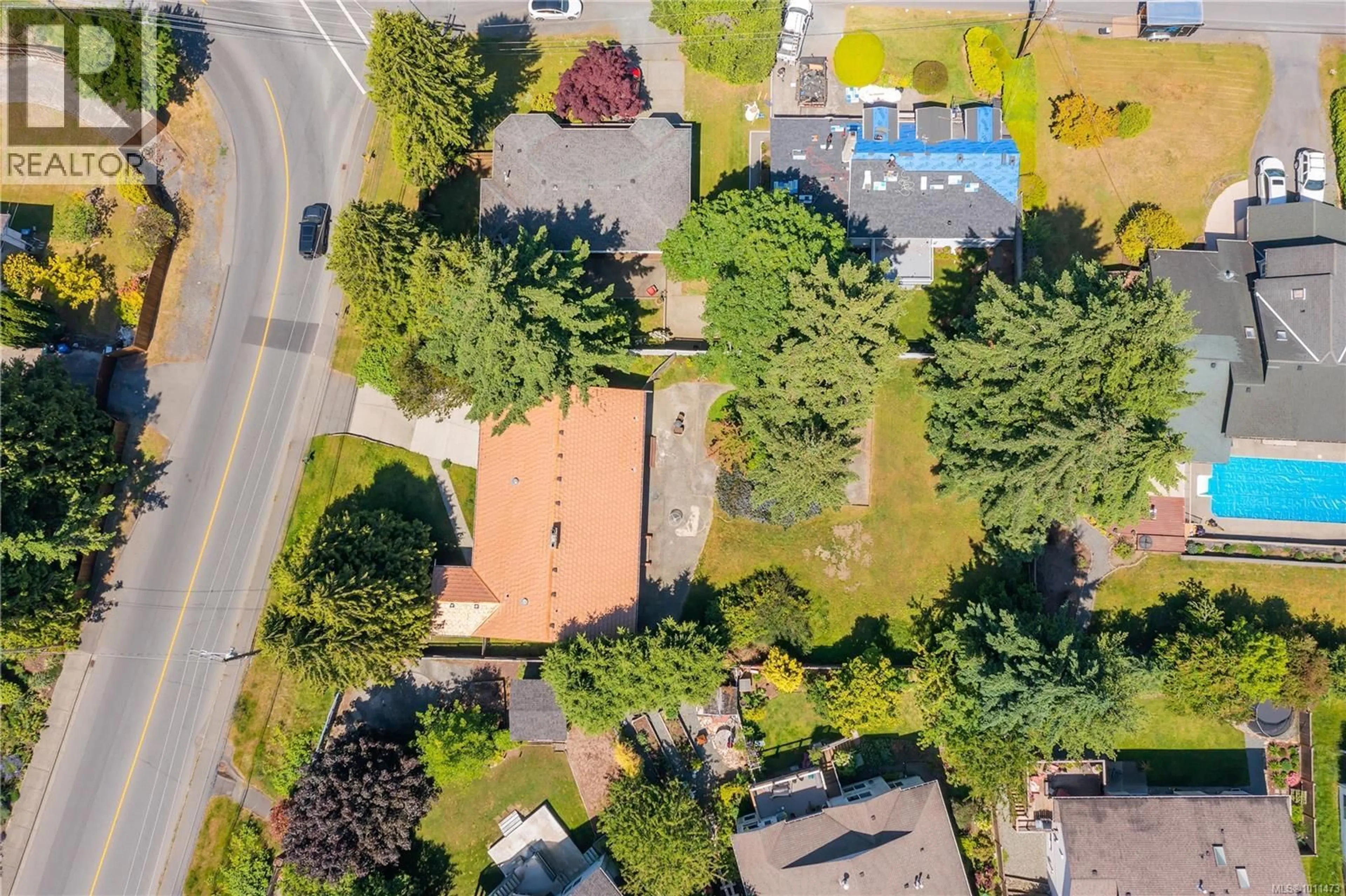 A pic from outside/outdoor area/front of a property/back of a property/a pic from drone, street for 5510 RUTHERFORD ROAD, Nanaimo British Columbia V9T5N4