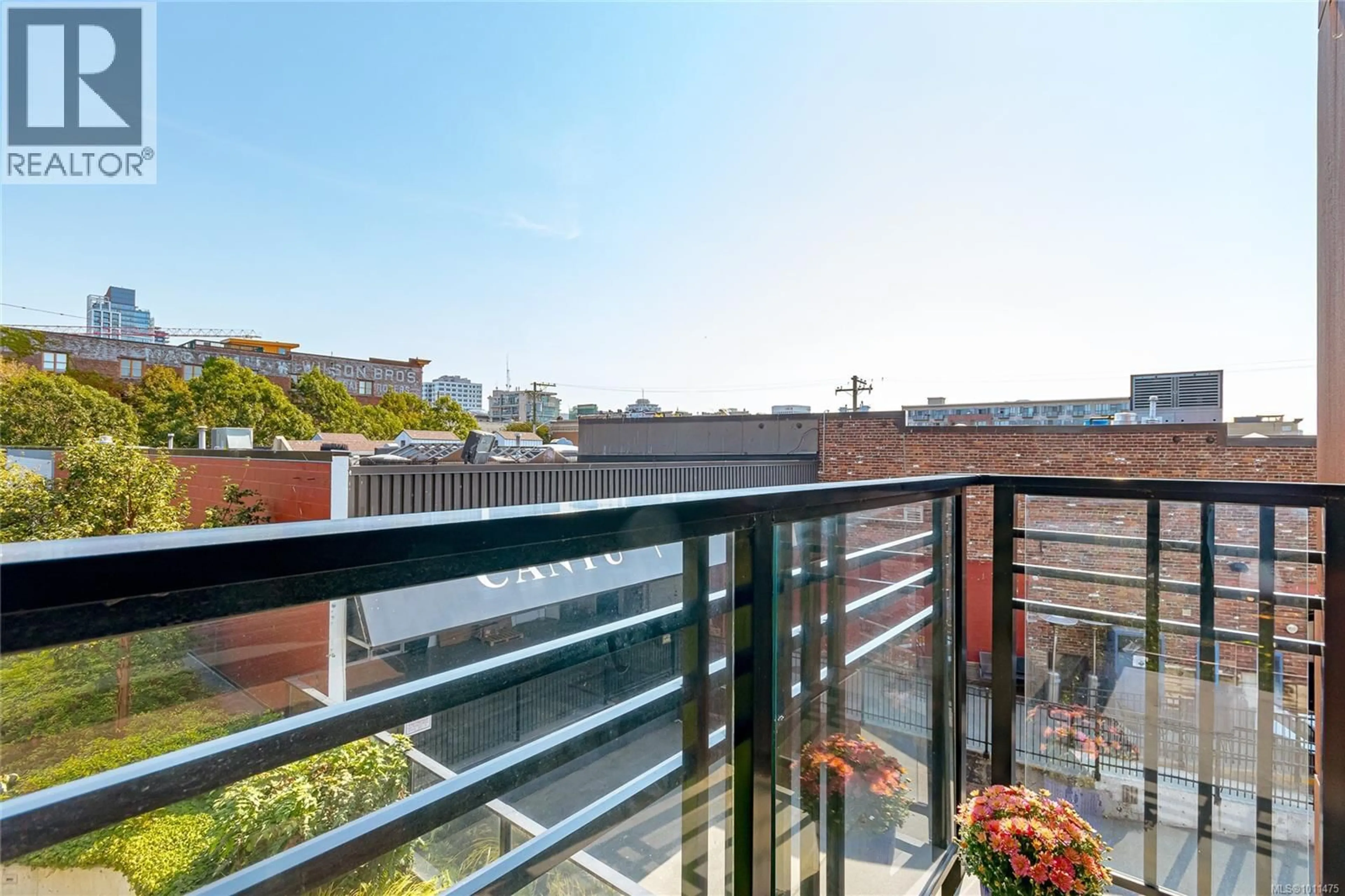 Balcony in the apartment, city buildings view from balcony for 307 - 515 CHATHAM STREET, Victoria British Columbia V8T0C8