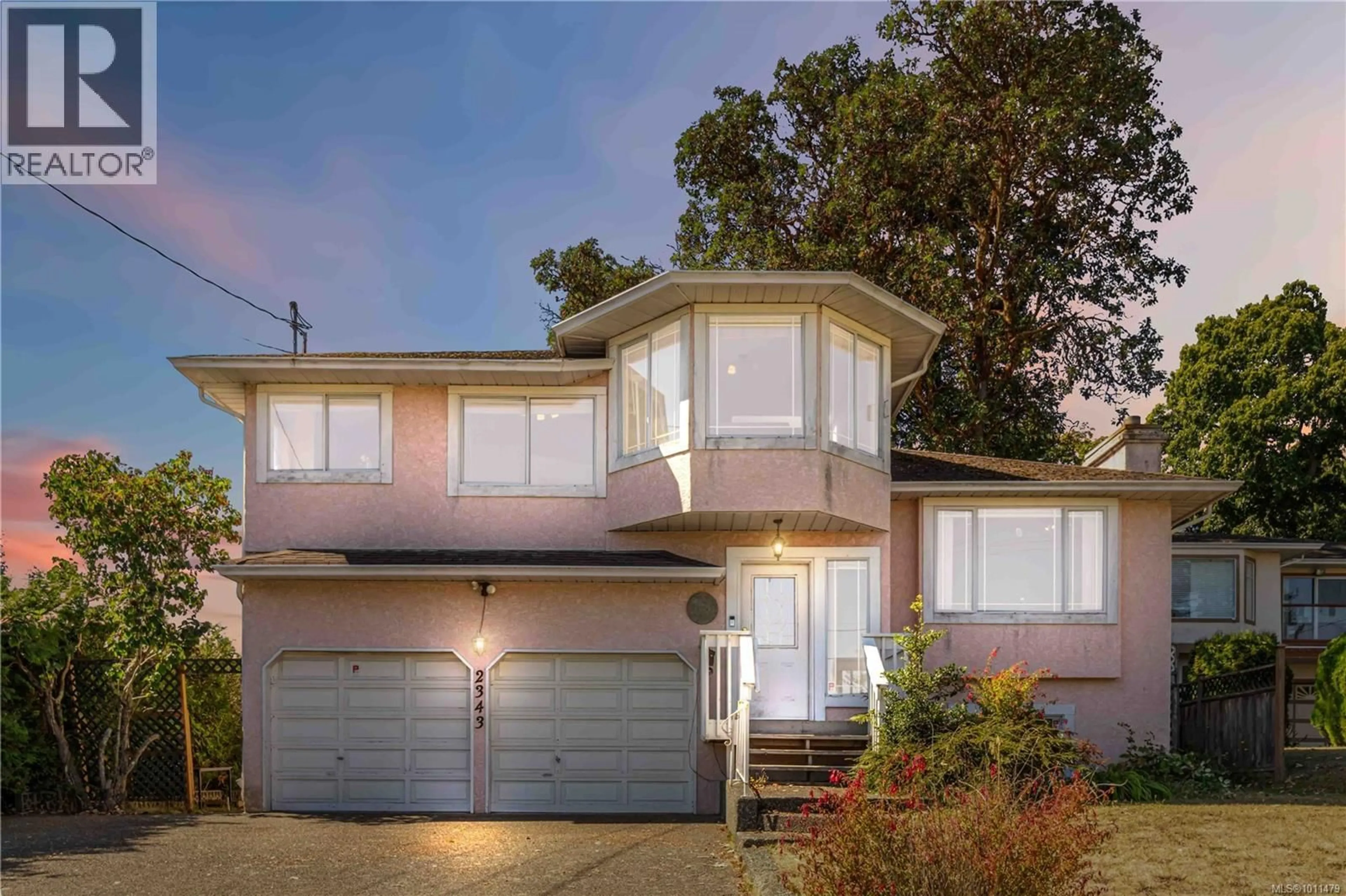 Home with vinyl exterior material, street for 2343 EDGELOW STREET, Saanich British Columbia V8N1R6
