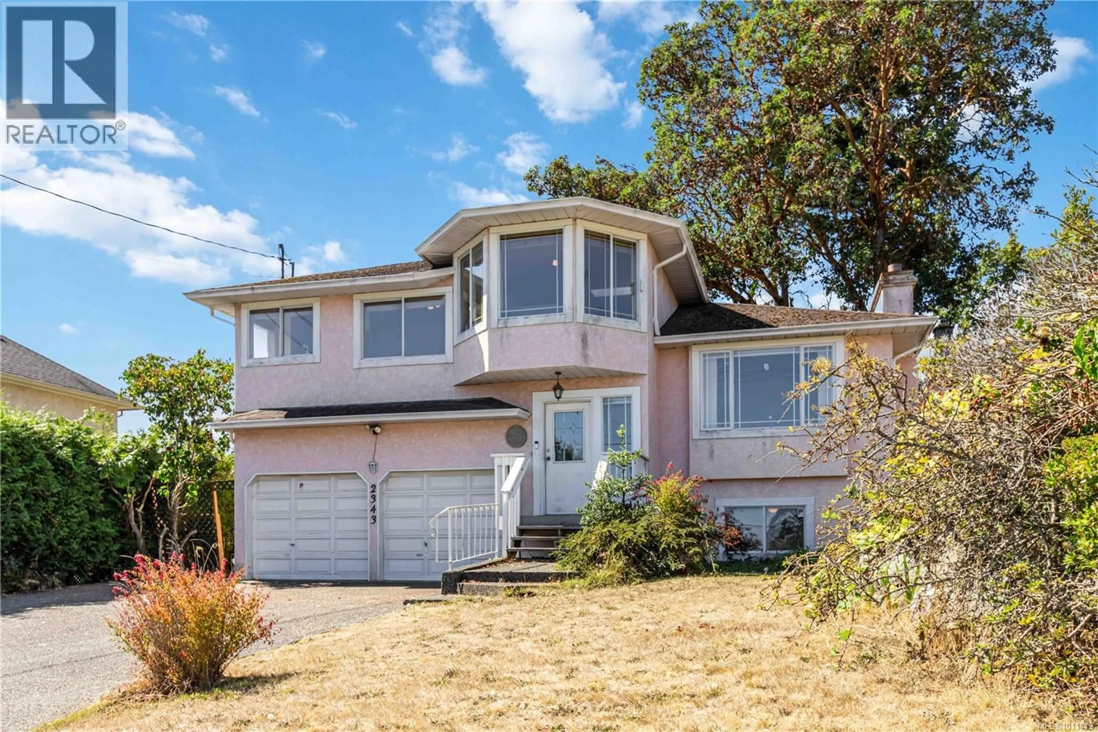 Home with vinyl exterior material, street for 2343 EDGELOW STREET, Saanich British Columbia V8N1R6