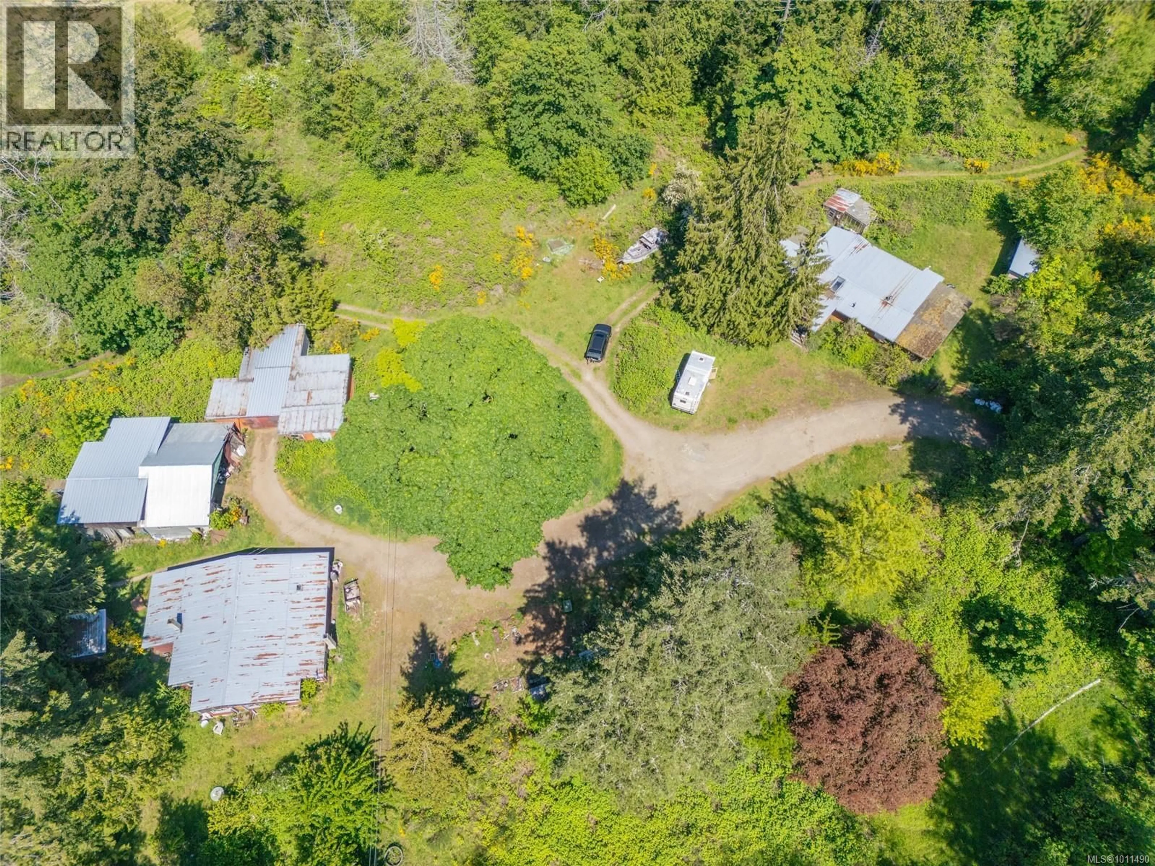 A pic from outside/outdoor area/front of a property/back of a property/a pic from drone, forest/trees view for 4510 BEDWELL HARBOUR ROAD, Pender Island British Columbia V0N2M1