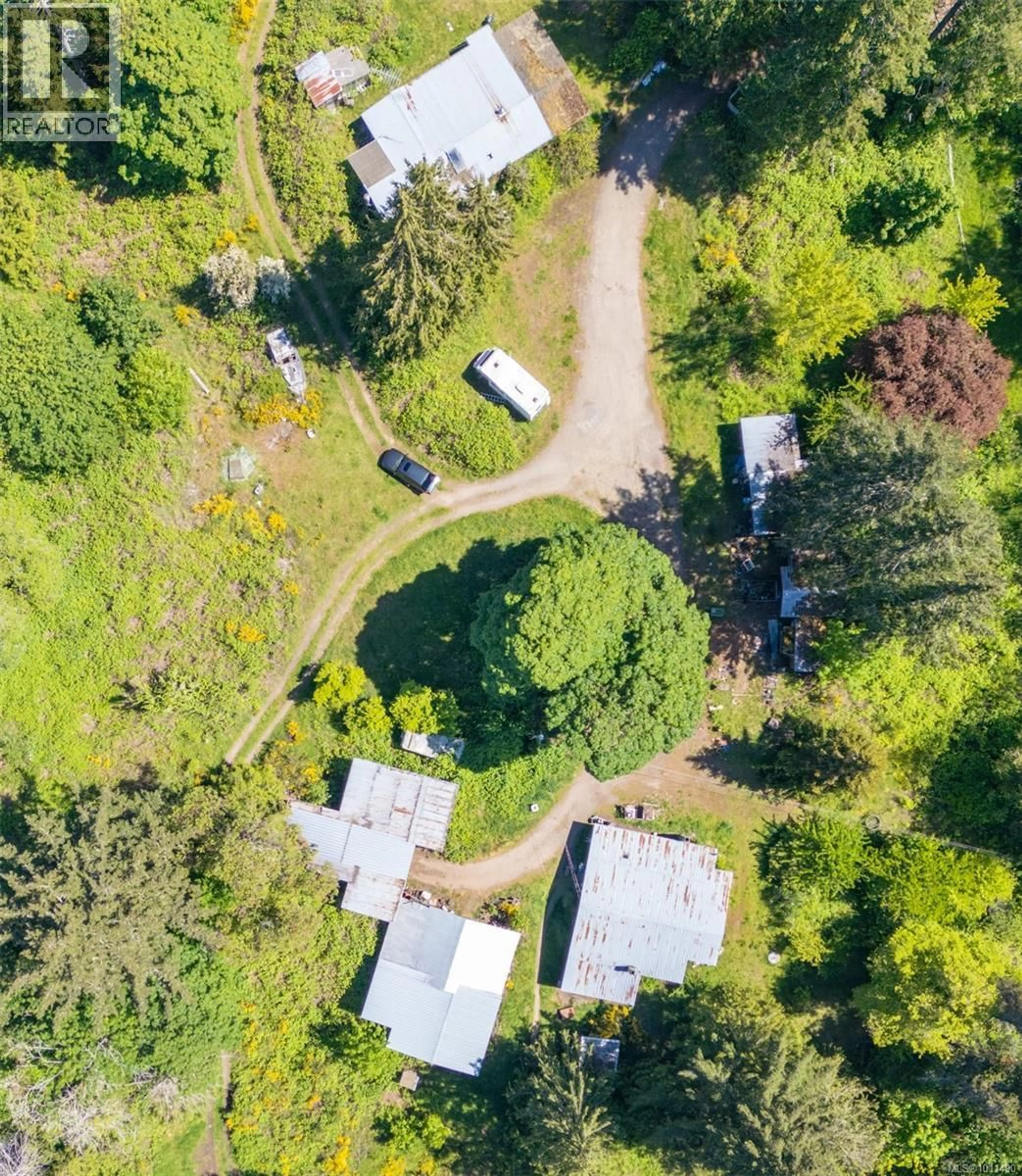A pic from outside/outdoor area/front of a property/back of a property/a pic from drone, forest/trees view for 4510 BEDWELL HARBOUR ROAD, Pender Island British Columbia V0N2M1