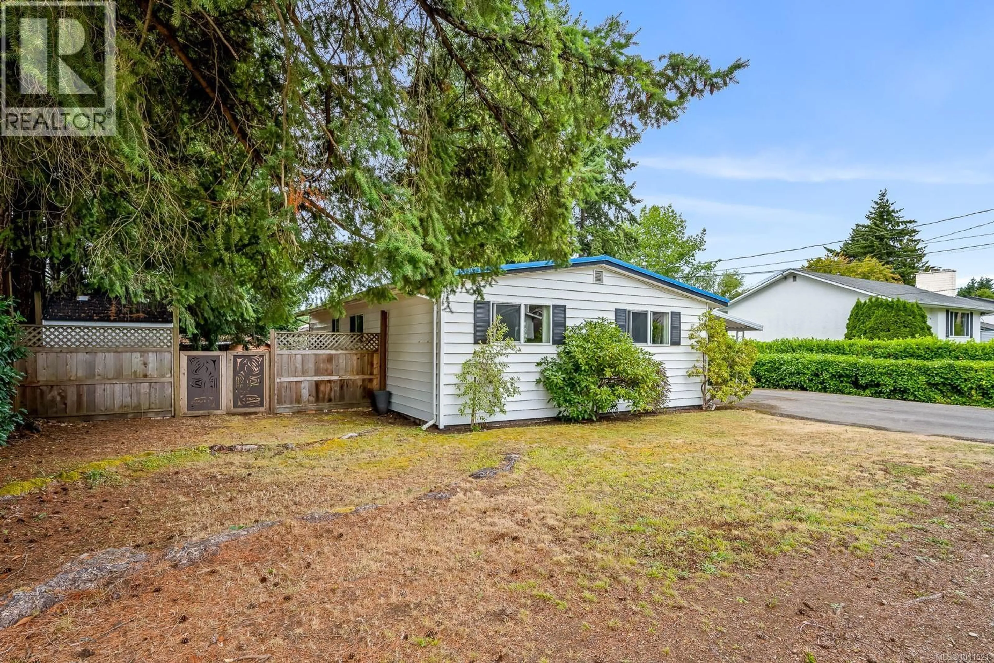Home with vinyl exterior material, street for 2255 PIERCY AVENUE, Courtenay British Columbia V9N3G7