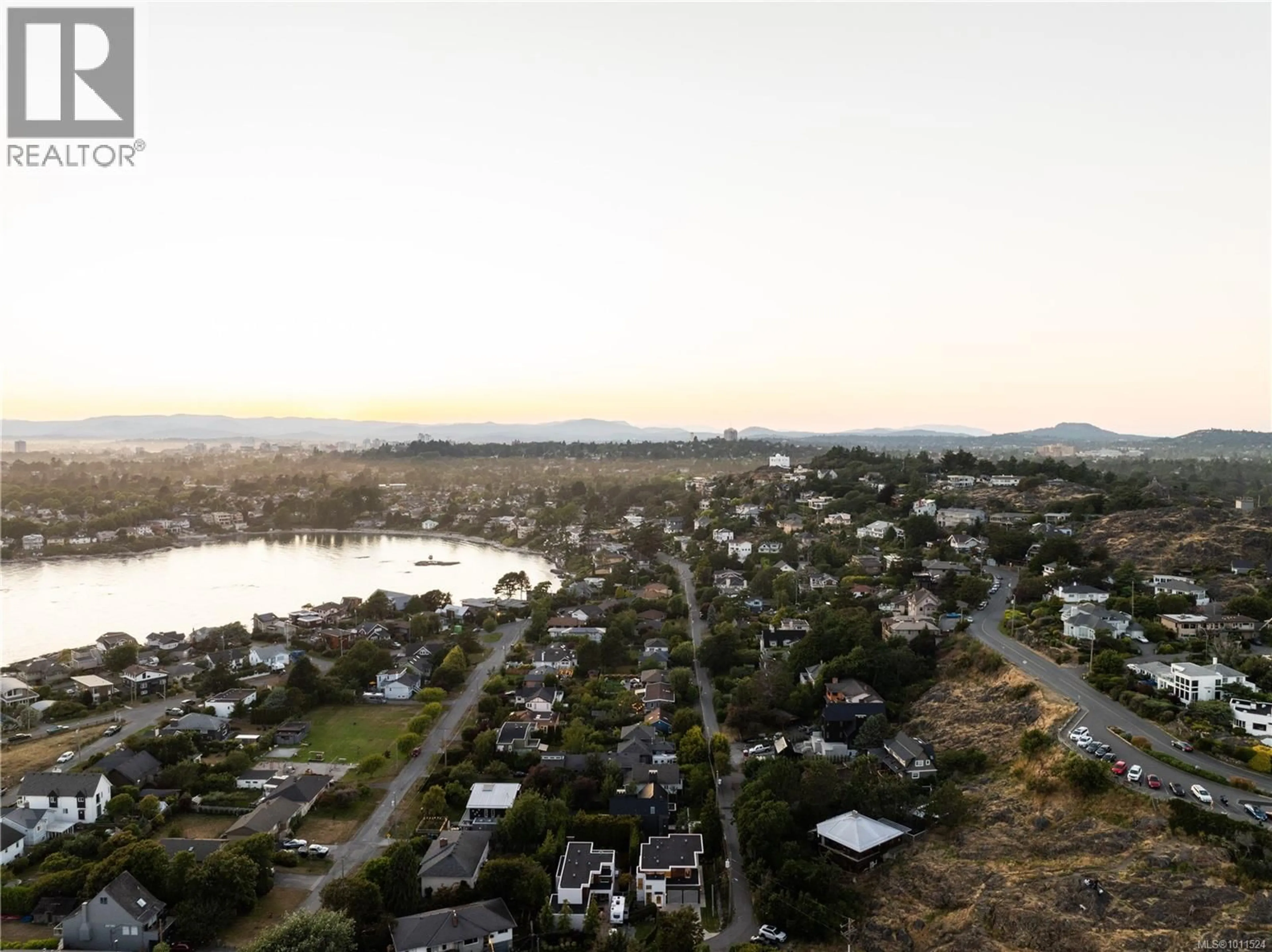 A pic from outside/outdoor area/front of a property/back of a property/a pic from drone, water/lake/river/ocean view for 52 MAQUINNA STREET, Oak Bay British Columbia V8S2J4