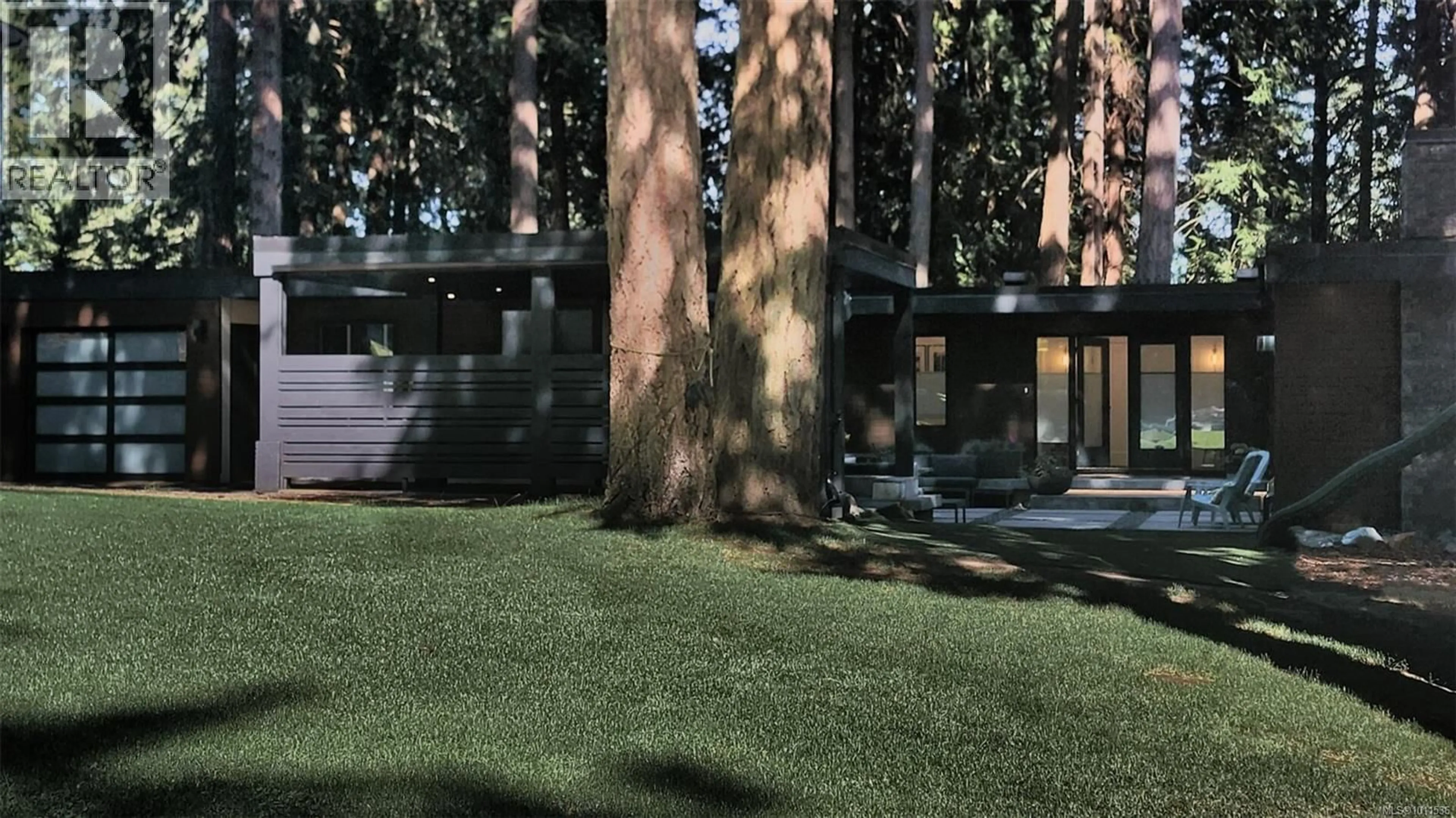 Home with vinyl exterior material, forest/trees view for 4657 AMBLEWOOD DRIVE, Saanich British Columbia V8Y1C1