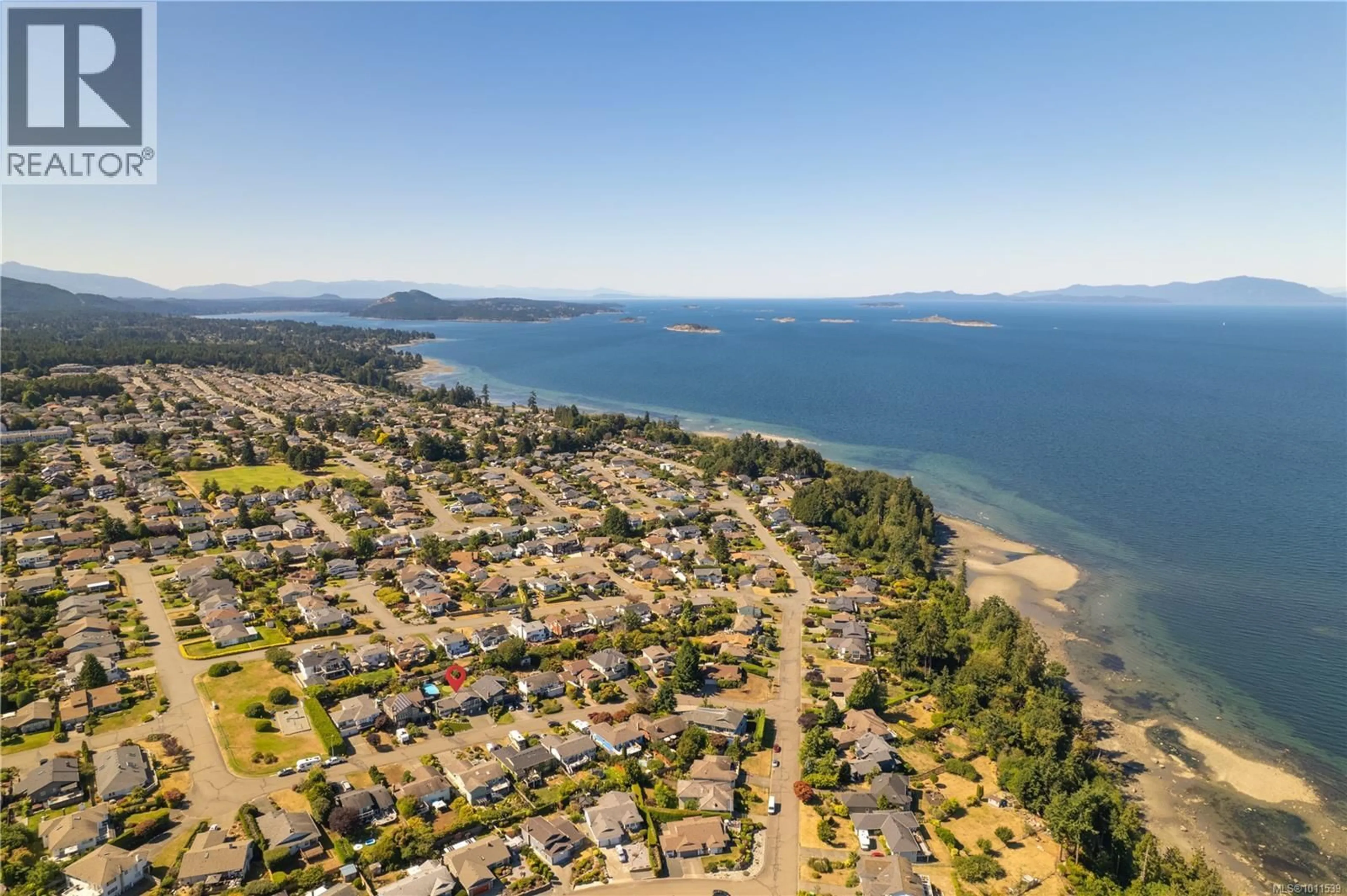 A pic from outside/outdoor area/front of a property/back of a property/a pic from drone, water/lake/river/ocean view for 6295 MCGIRR ROAD, Nanaimo British Columbia V9V1C3