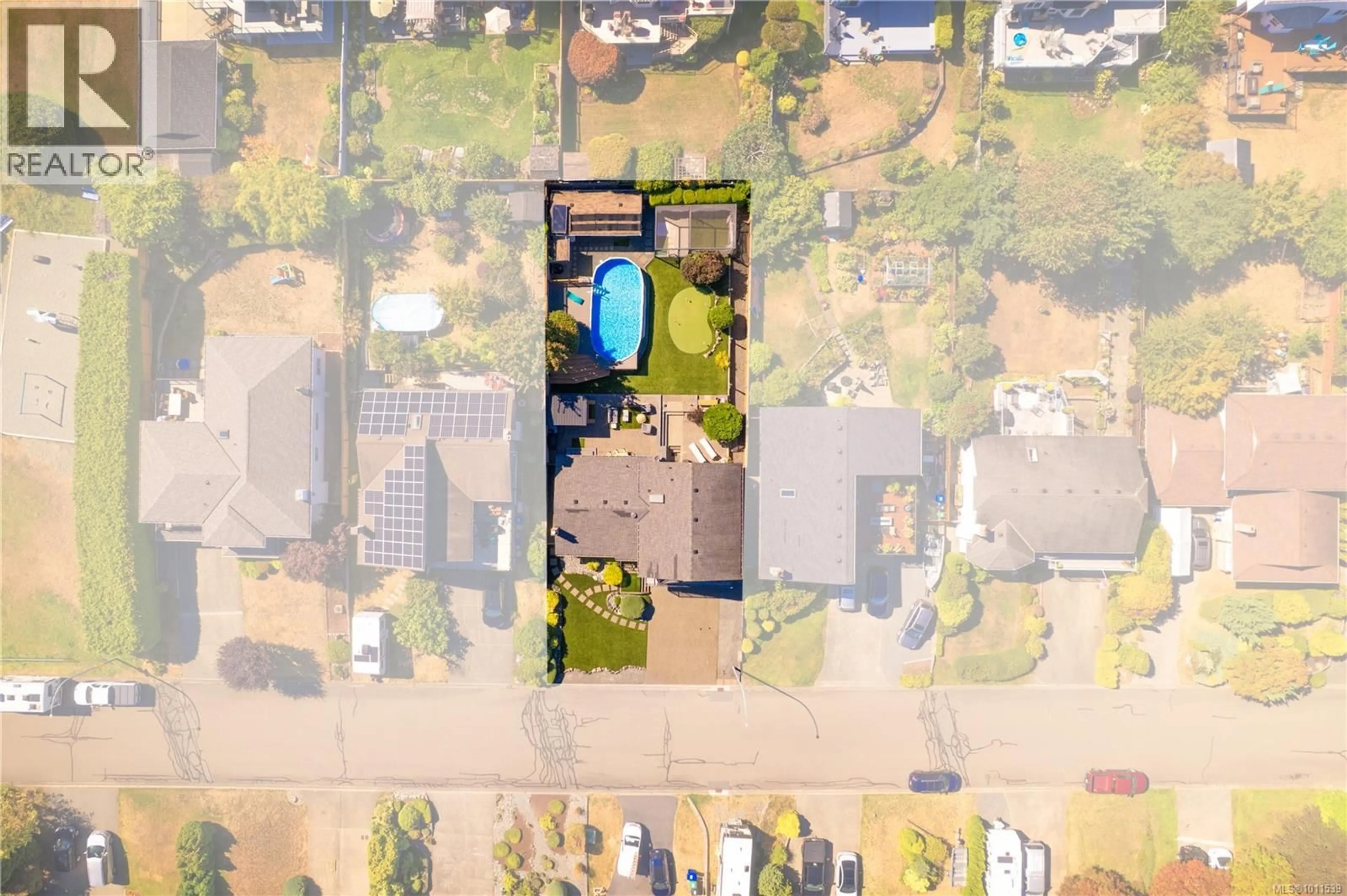 A pic from outside/outdoor area/front of a property/back of a property/a pic from drone, street for 6295 MCGIRR ROAD, Nanaimo British Columbia V9V1C3