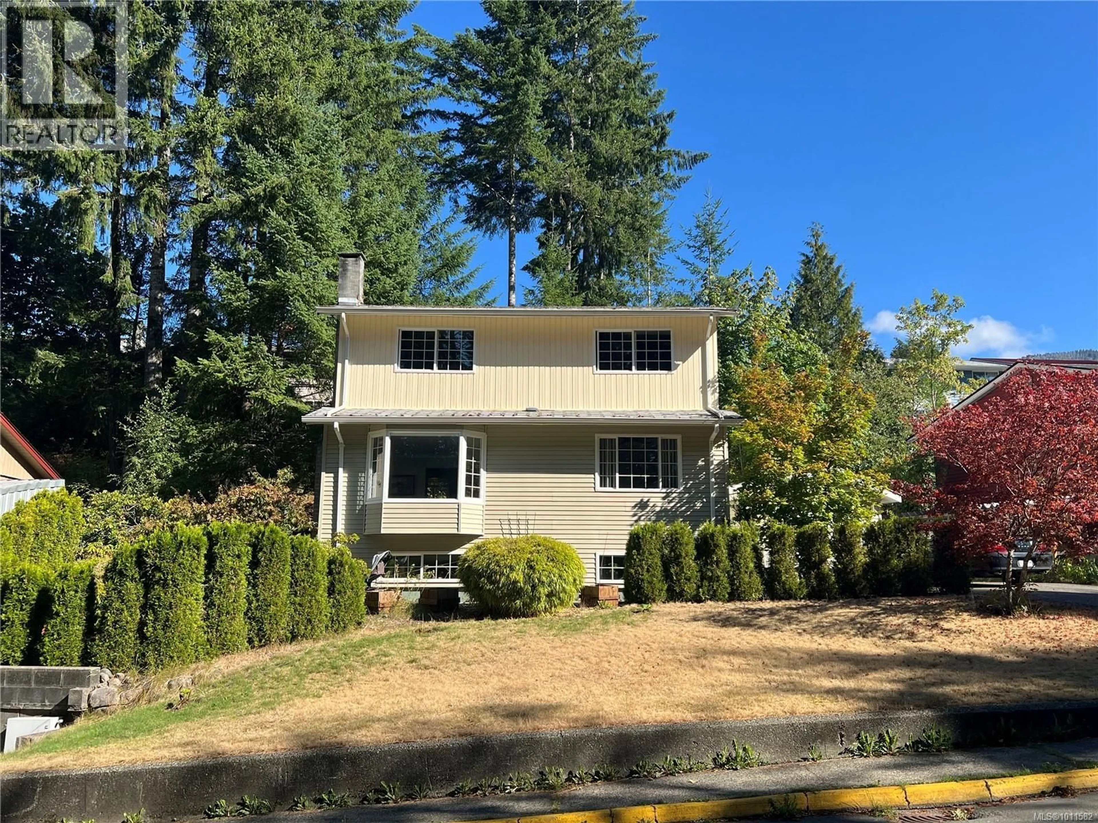 Home with vinyl exterior material, street for 356 NOOTKA DRIVE, Gold River British Columbia V0P1G0