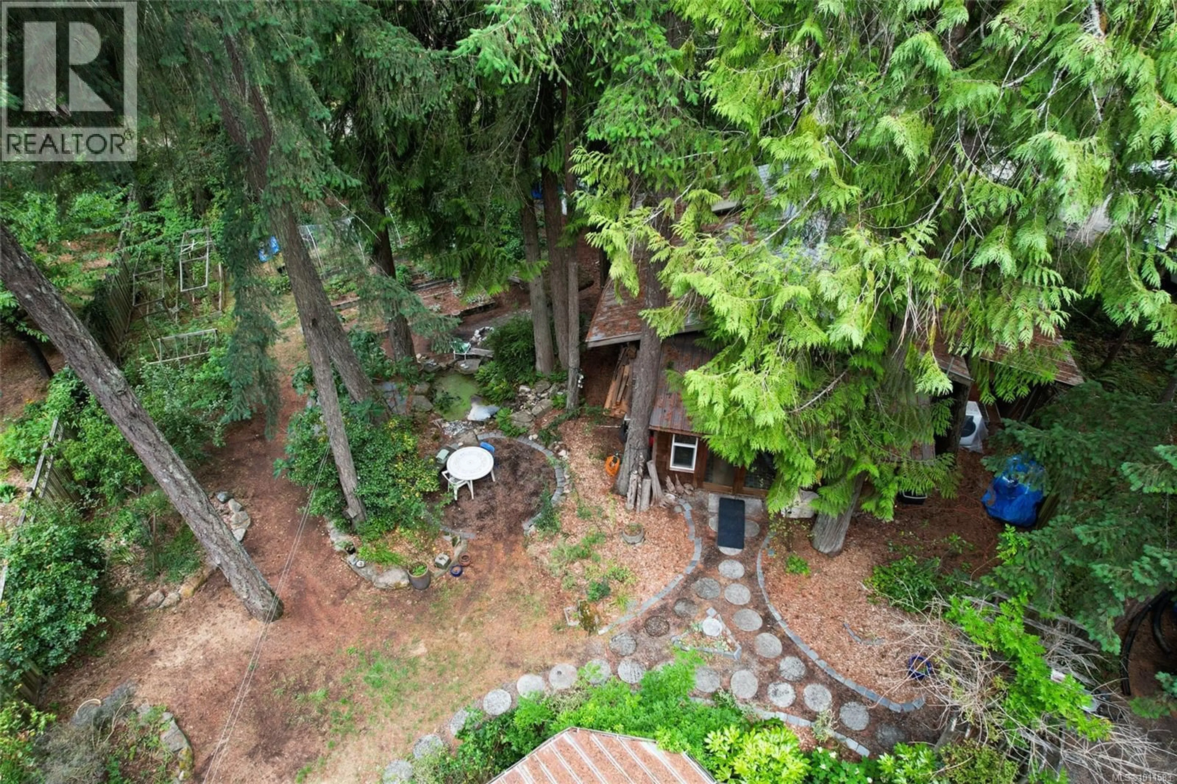 A pic from outside/outdoor area/front of a property/back of a property/a pic from drone, forest/trees view for 620 GALLAGHER WAY, Gabriola Island British Columbia V0R1X3
