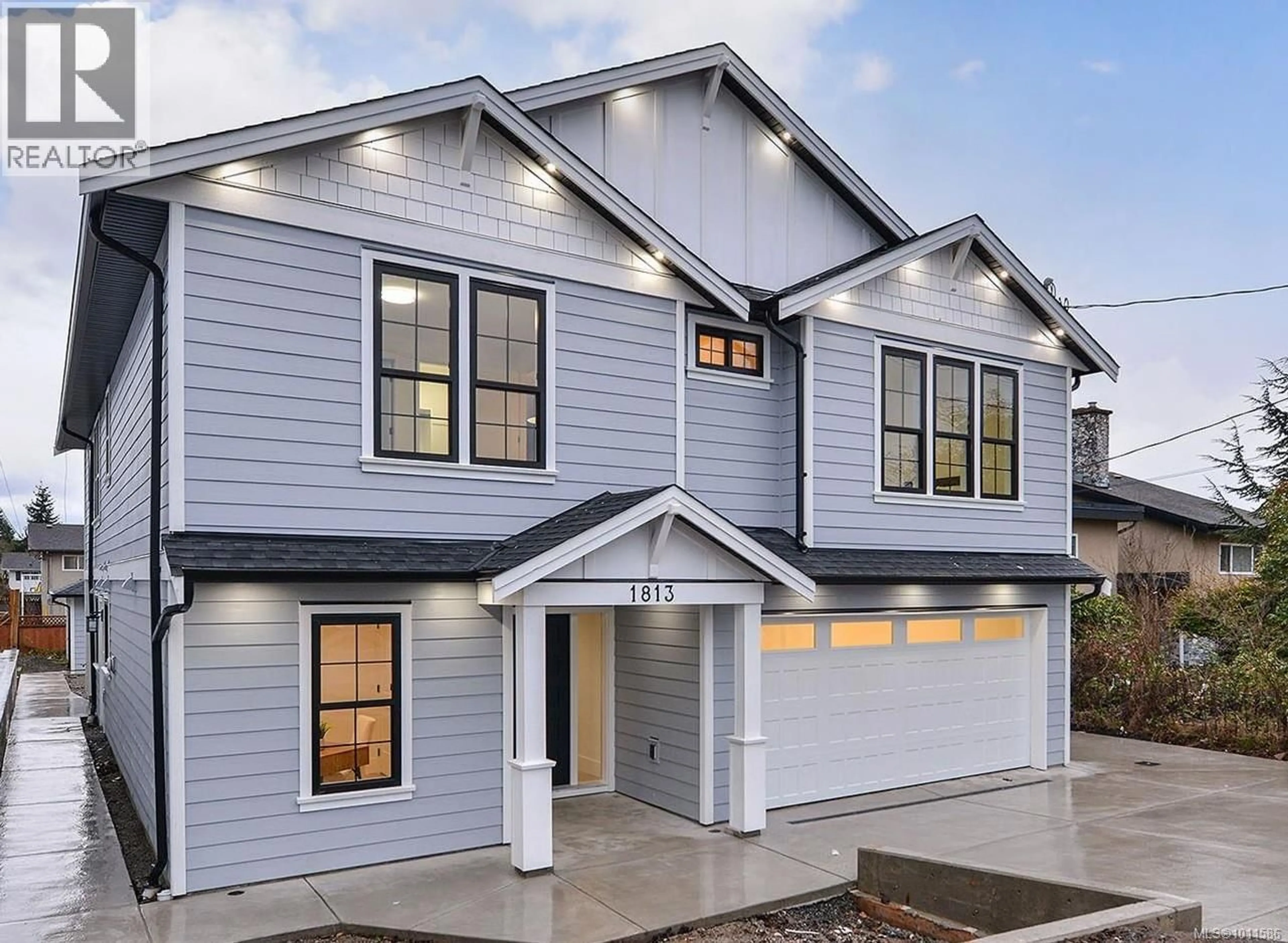 Home with vinyl exterior material, street for 1813 FELTHAM ROAD, Saanich British Columbia V8N2A4