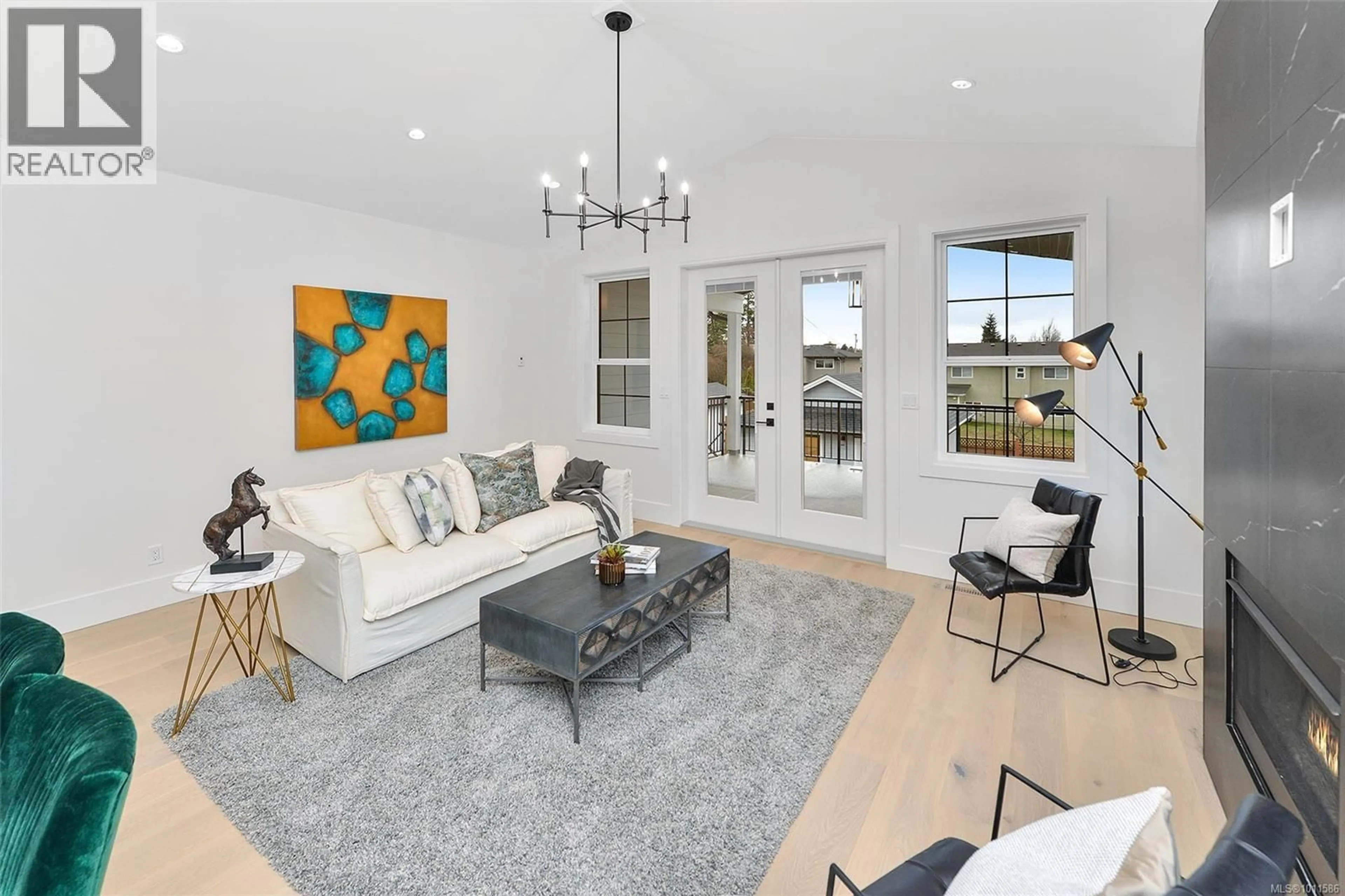Living room with furniture, unknown for 1813 FELTHAM ROAD, Saanich British Columbia V8N2A4