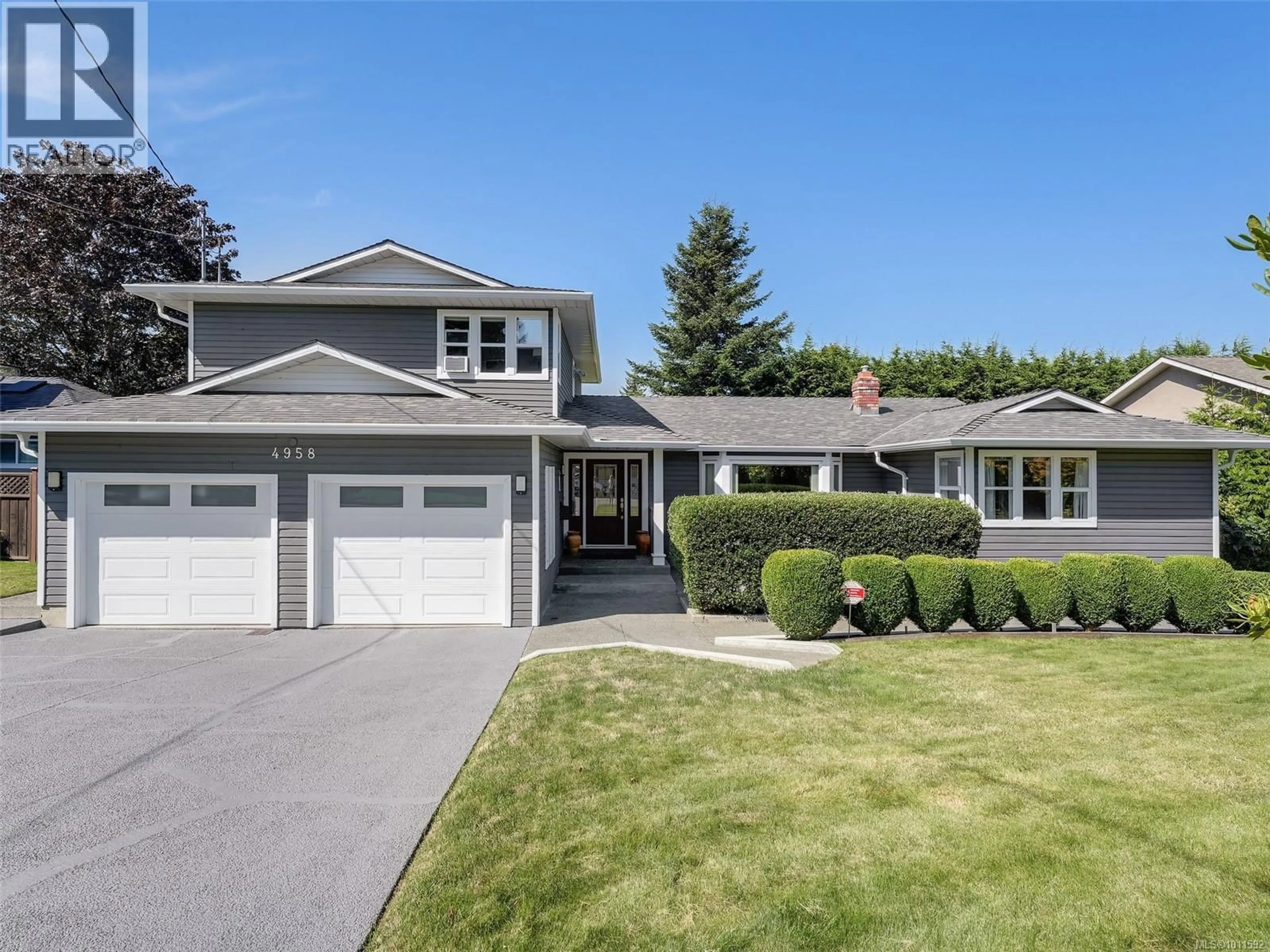 Home with vinyl exterior material, street for 4958 WESLEY ROAD, Saanich British Columbia V8Y1Y9