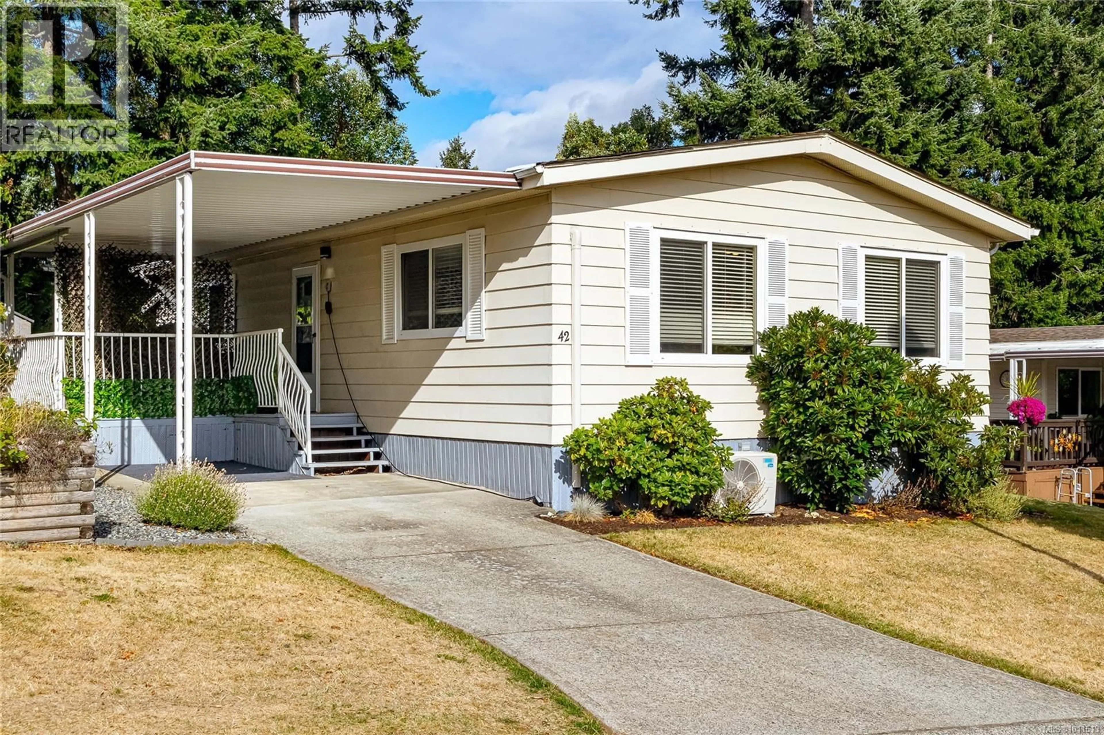 Home with vinyl exterior material, street for 42 - 2501 LABIEUX ROAD, Nanaimo British Columbia V9T5A6