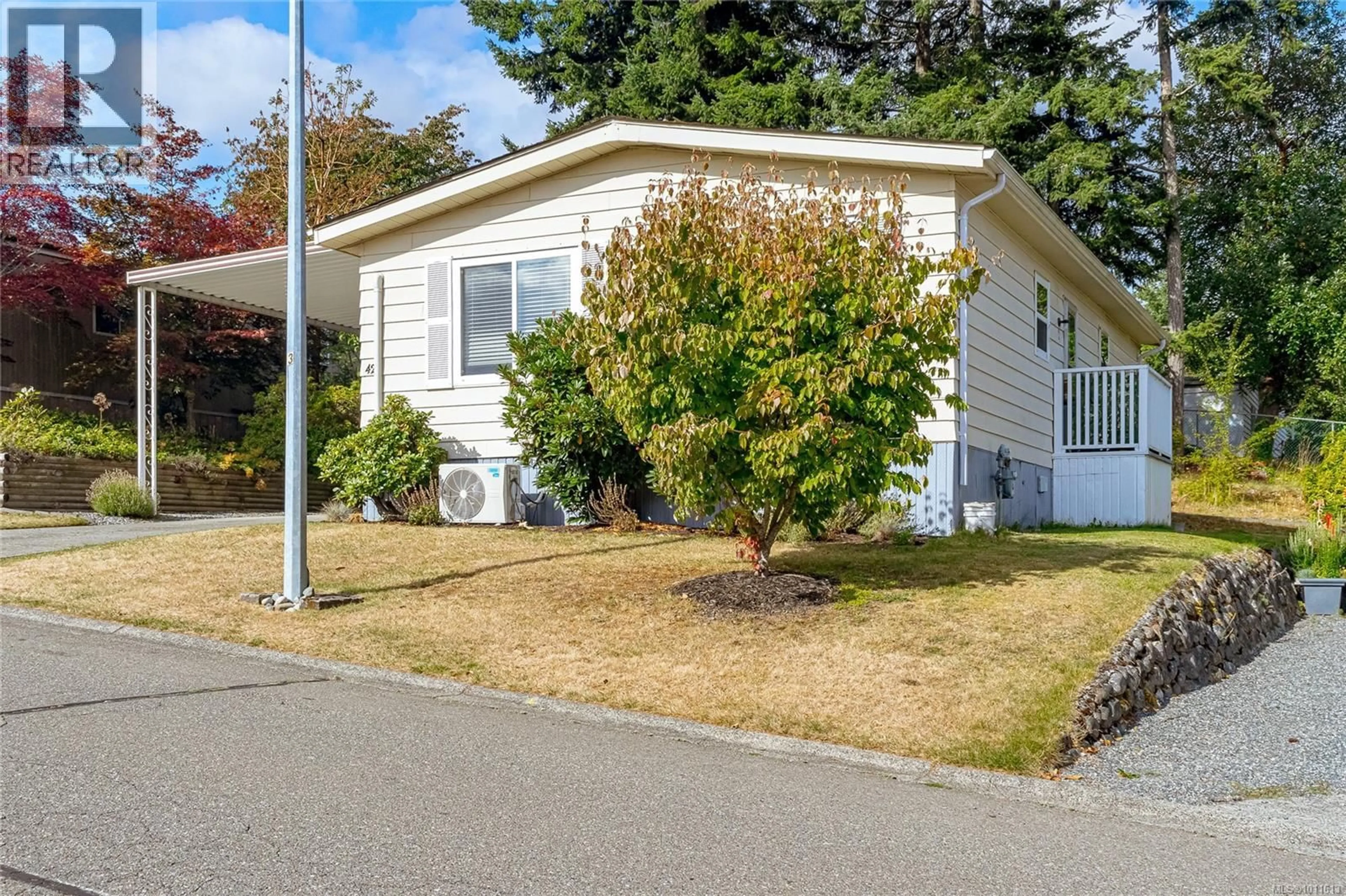 Home with vinyl exterior material, street for 42 - 2501 LABIEUX ROAD, Nanaimo British Columbia V9T5A6