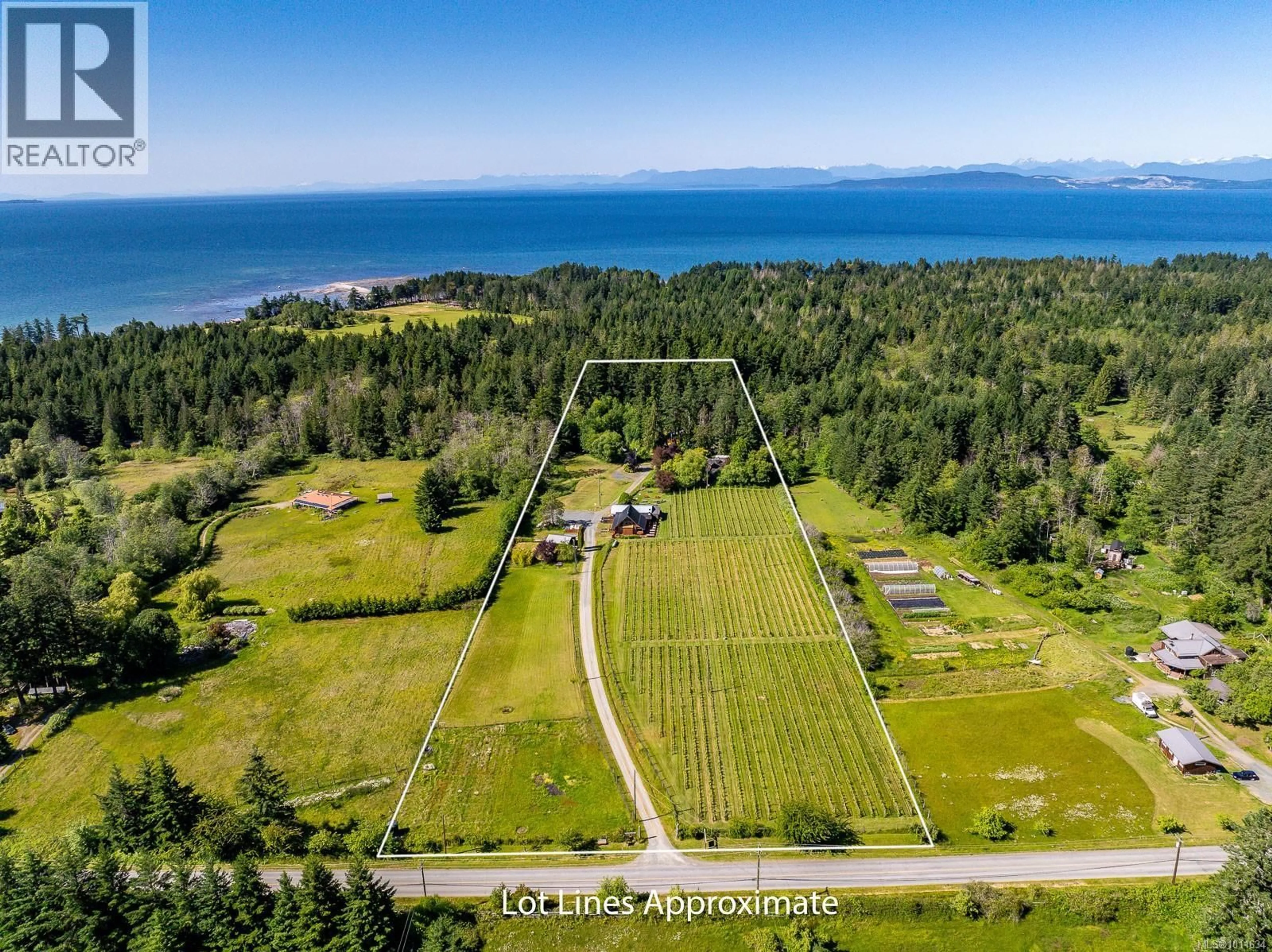 A pic from outside/outdoor area/front of a property/back of a property/a pic from drone, water/lake/river/ocean view for 1885 CENTRAL ROAD, Hornby Island British Columbia V0R1Z0
