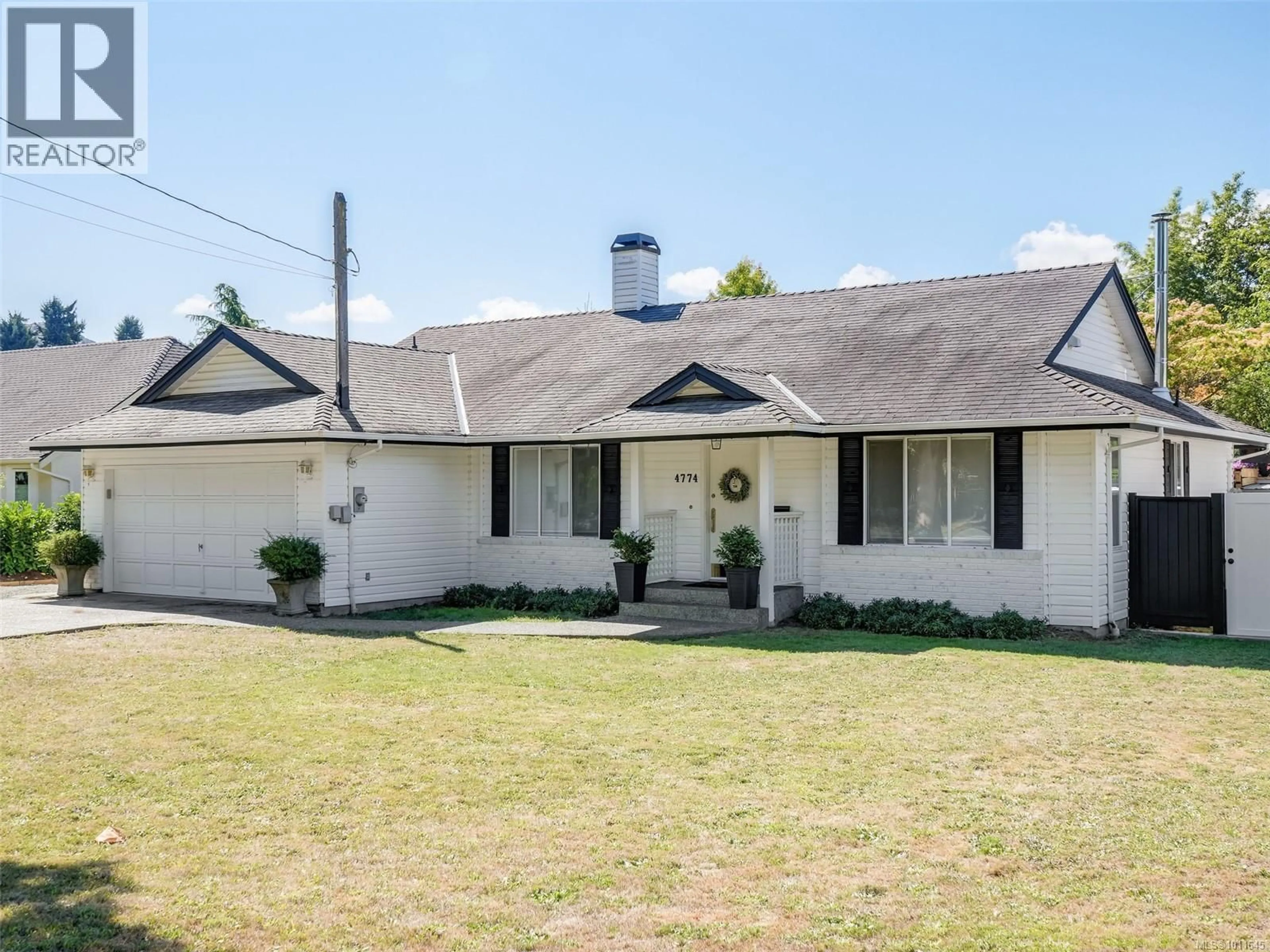 Home with vinyl exterior material, street for 4774 CORDOVA BAY ROAD, Saanich British Columbia V8Y2J5