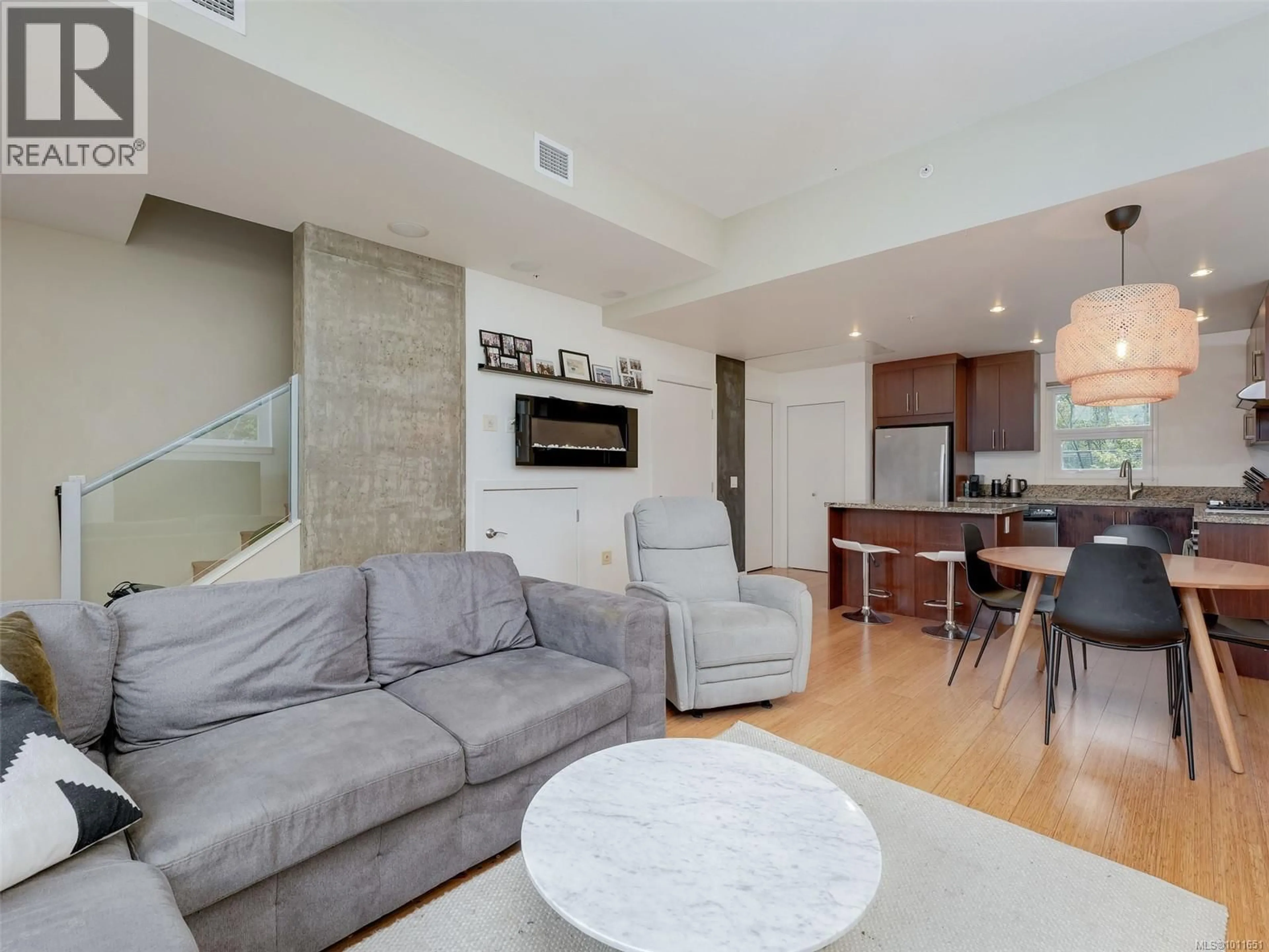 Living room with furniture, unknown for 101 - 379 TYEE ROAD, Victoria British Columbia V9A0B4