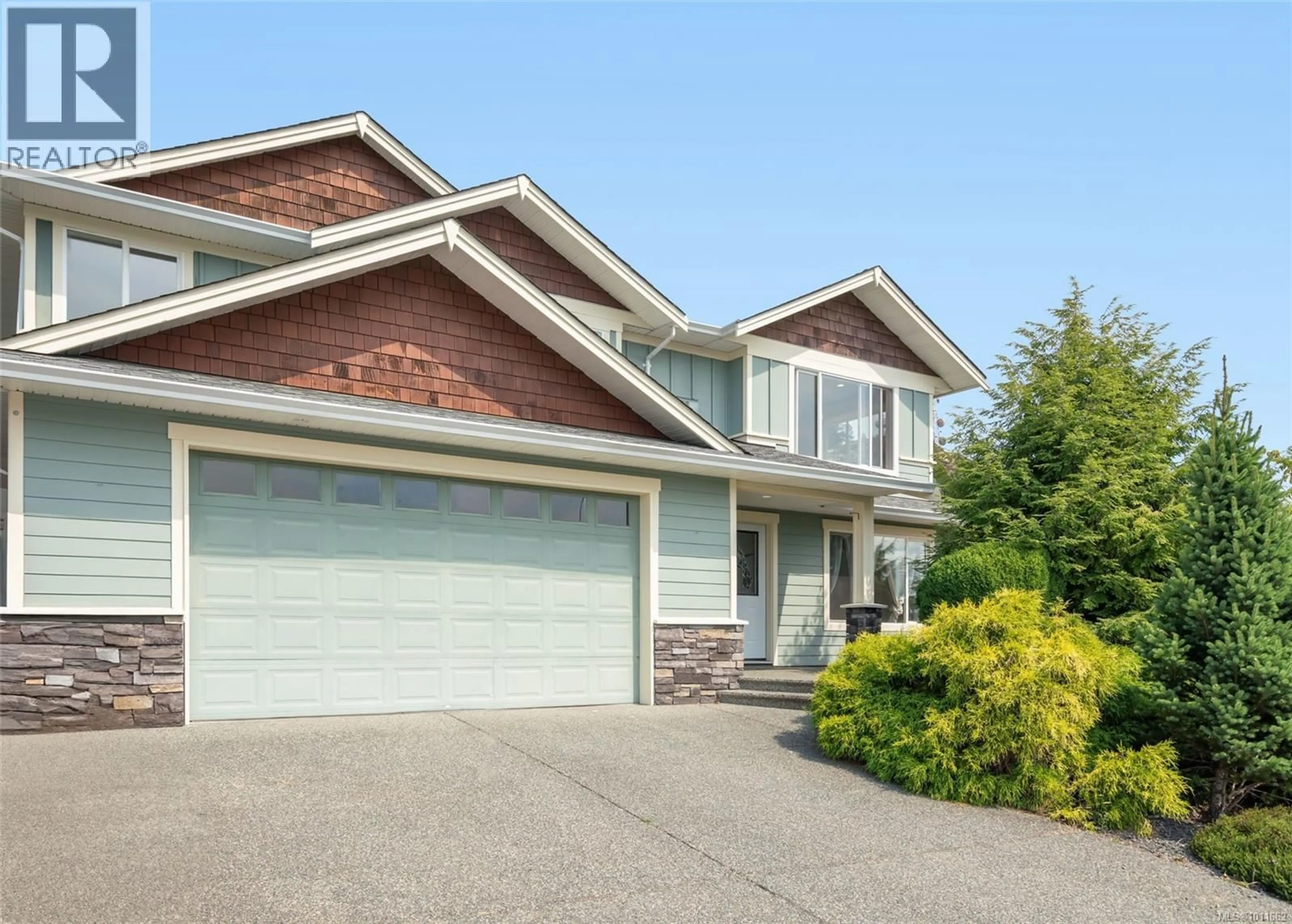 Home with vinyl exterior material, street for 5217 COUGAR TRAIL ROAD, Nanaimo British Columbia V9T6R6