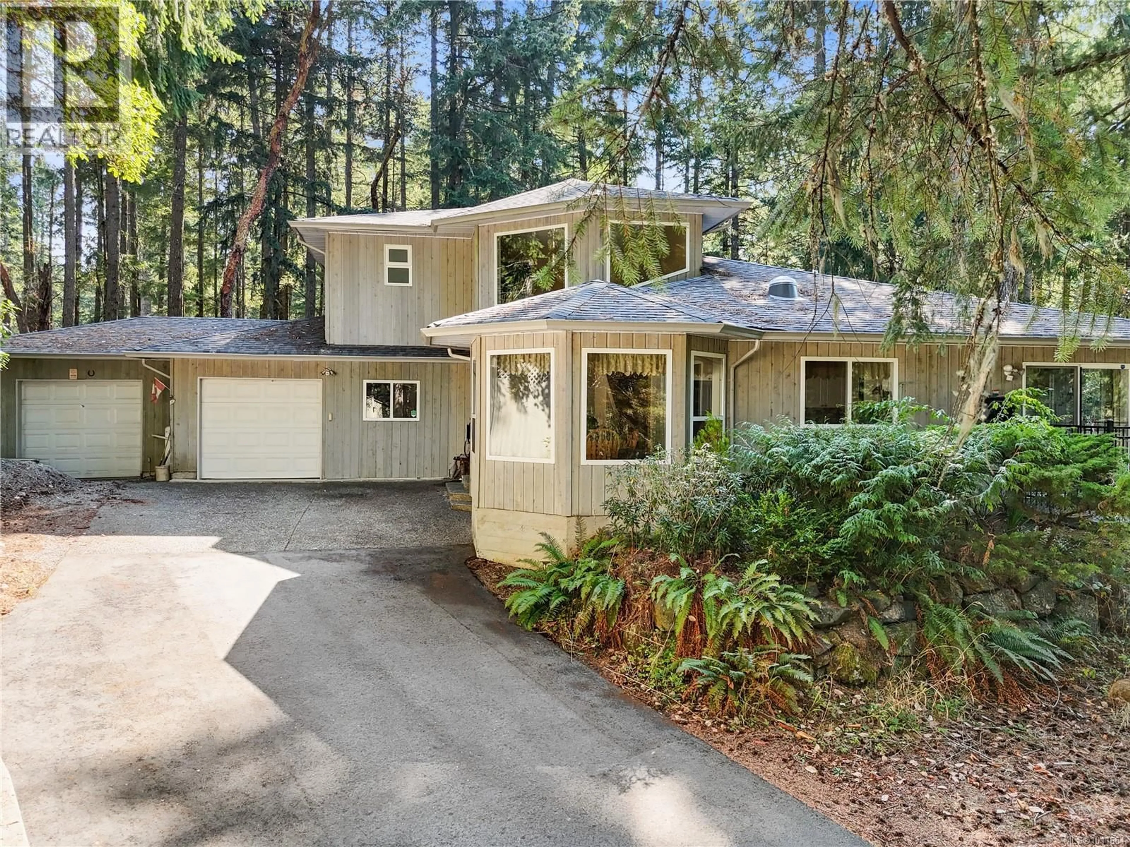 Home with vinyl exterior material, street for 661 MILLSTREAM LAKE ROAD, Highlands British Columbia V9B6E9