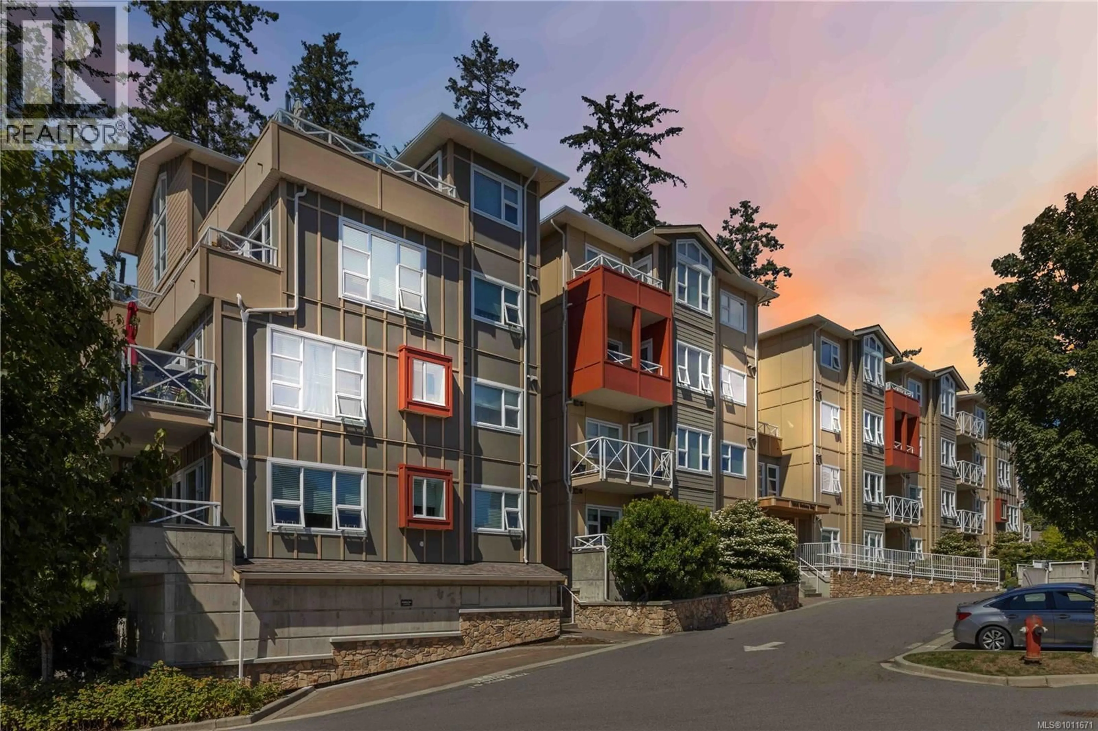 A pic from outside/outdoor area/front of a property/back of a property/a pic from drone, street for 408 - 1900 WATKISS WAY, View Royal British Columbia V9B0S8