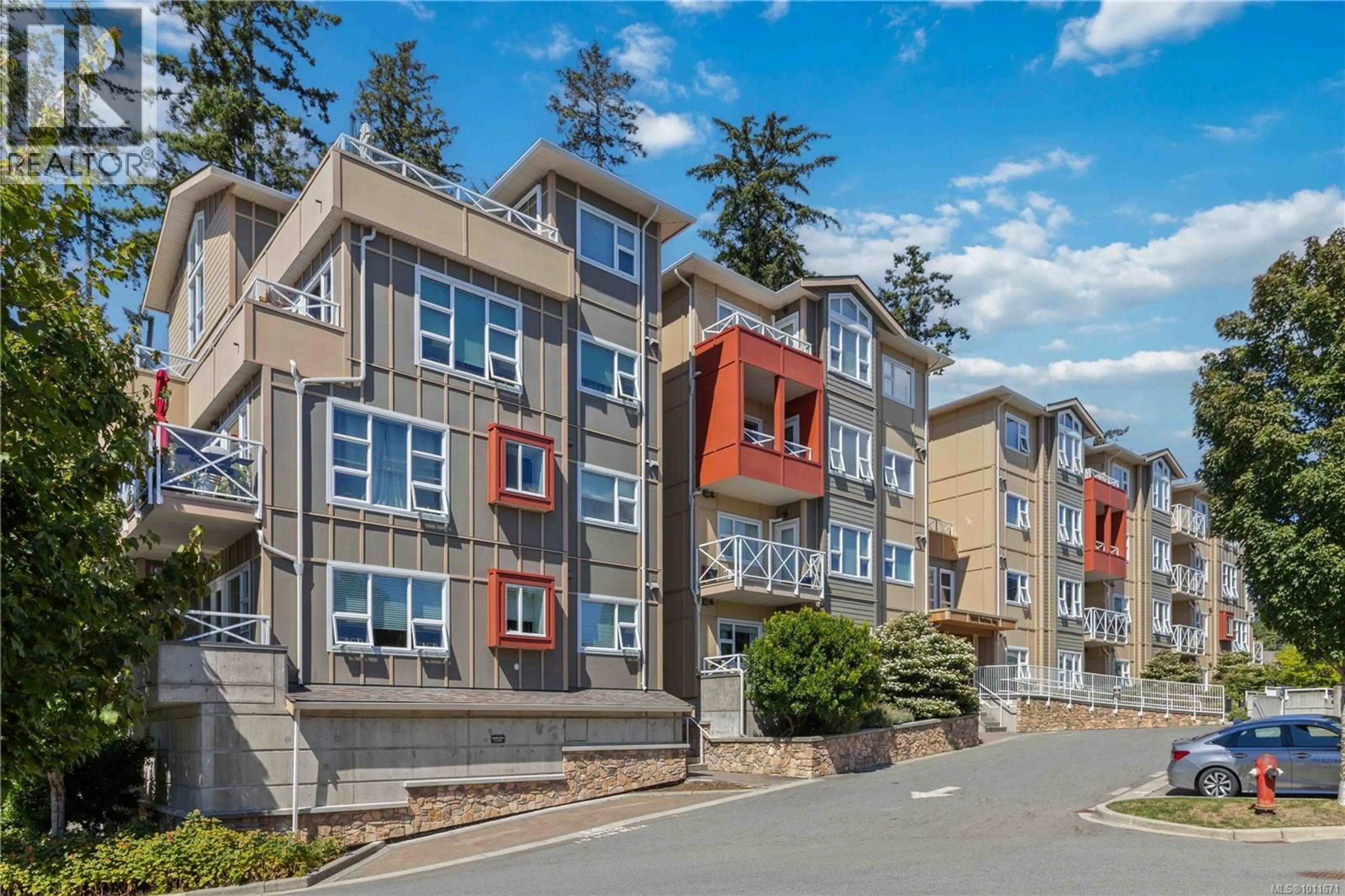 A pic from outside/outdoor area/front of a property/back of a property/a pic from drone, unknown for 408 - 1900 WATKISS WAY, View Royal British Columbia V9B0S8