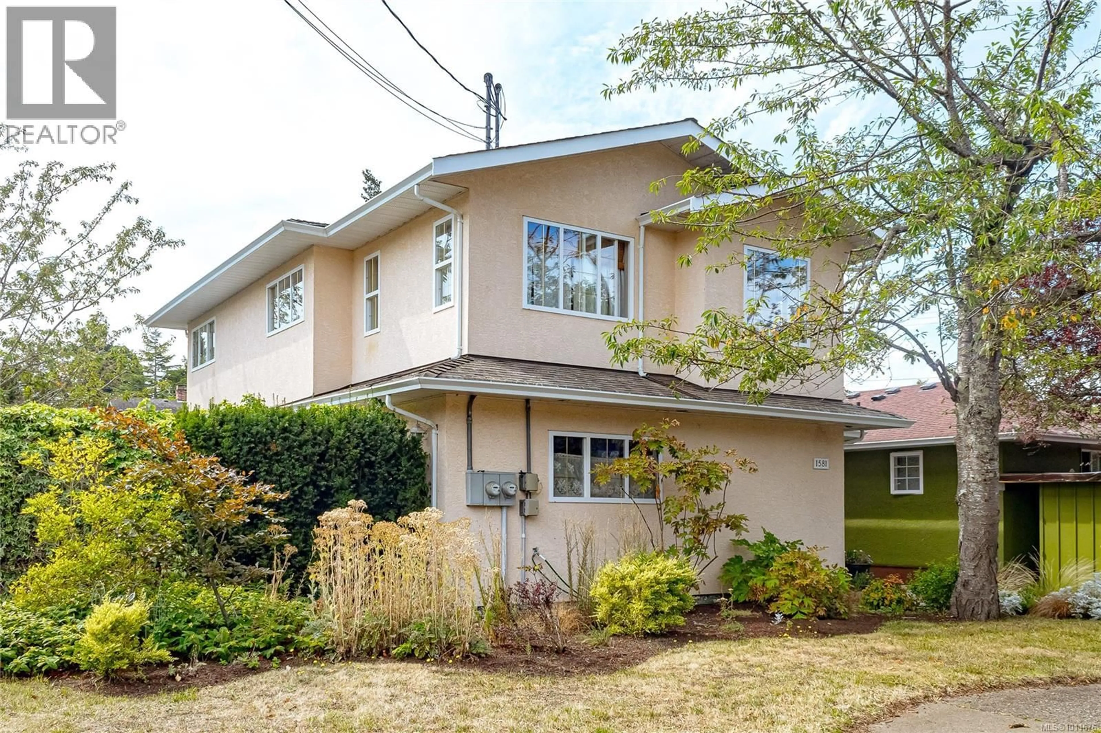 Home with vinyl exterior material, street for 1581 DENMAN STREET, Victoria British Columbia V8R1X8